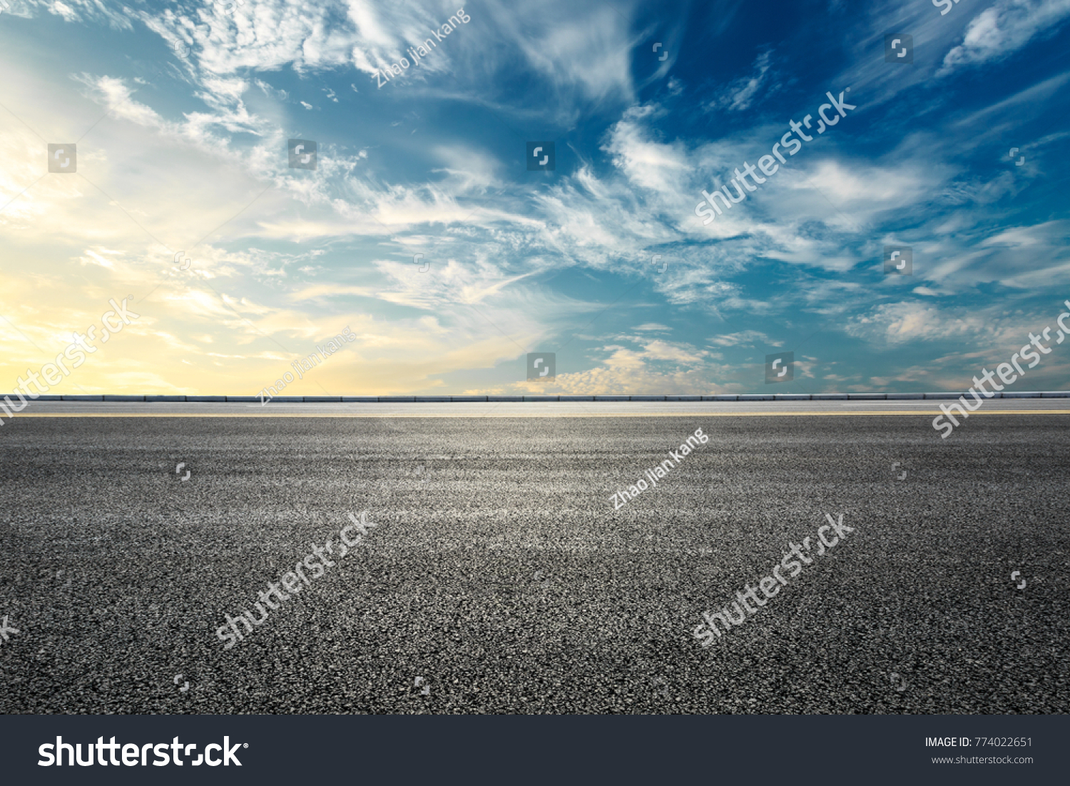 Empty highway asphalt road and beautiful sky sunset landscape #774022651
