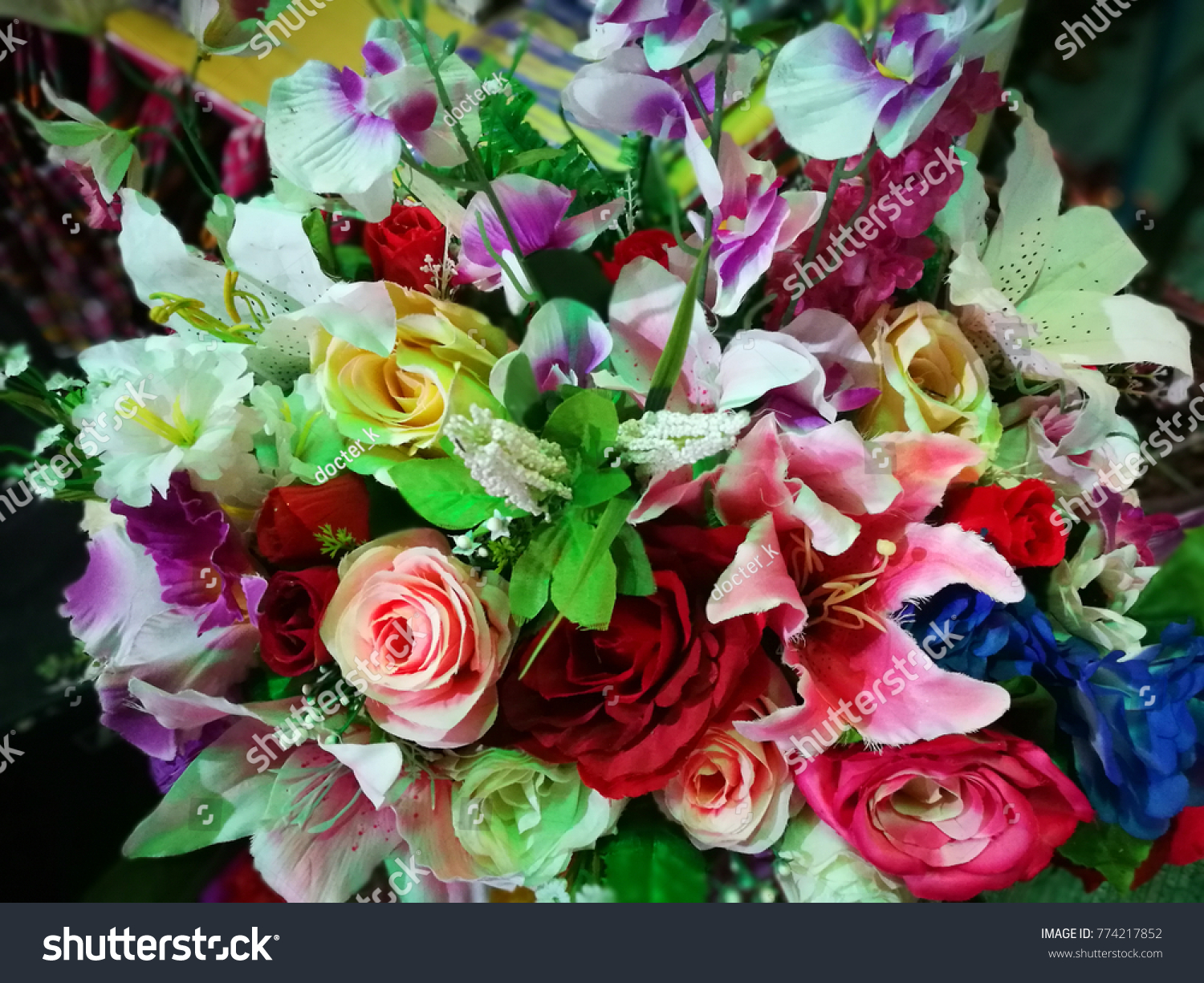 Colorful flowers red, green,yellow purple and pink  in basket .vintage style. #774217852