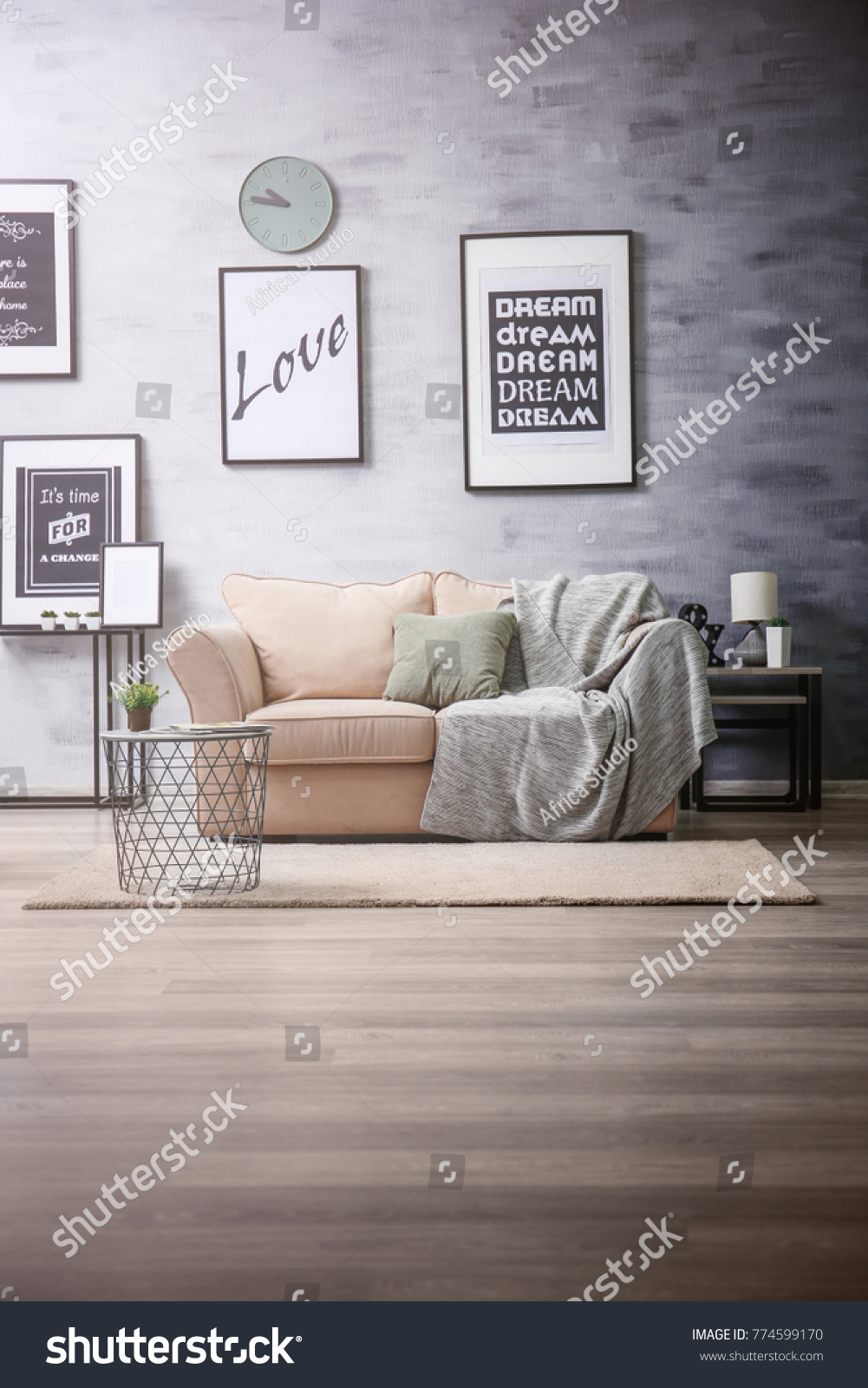 Interior of living room with comfortable sofa #774599170
