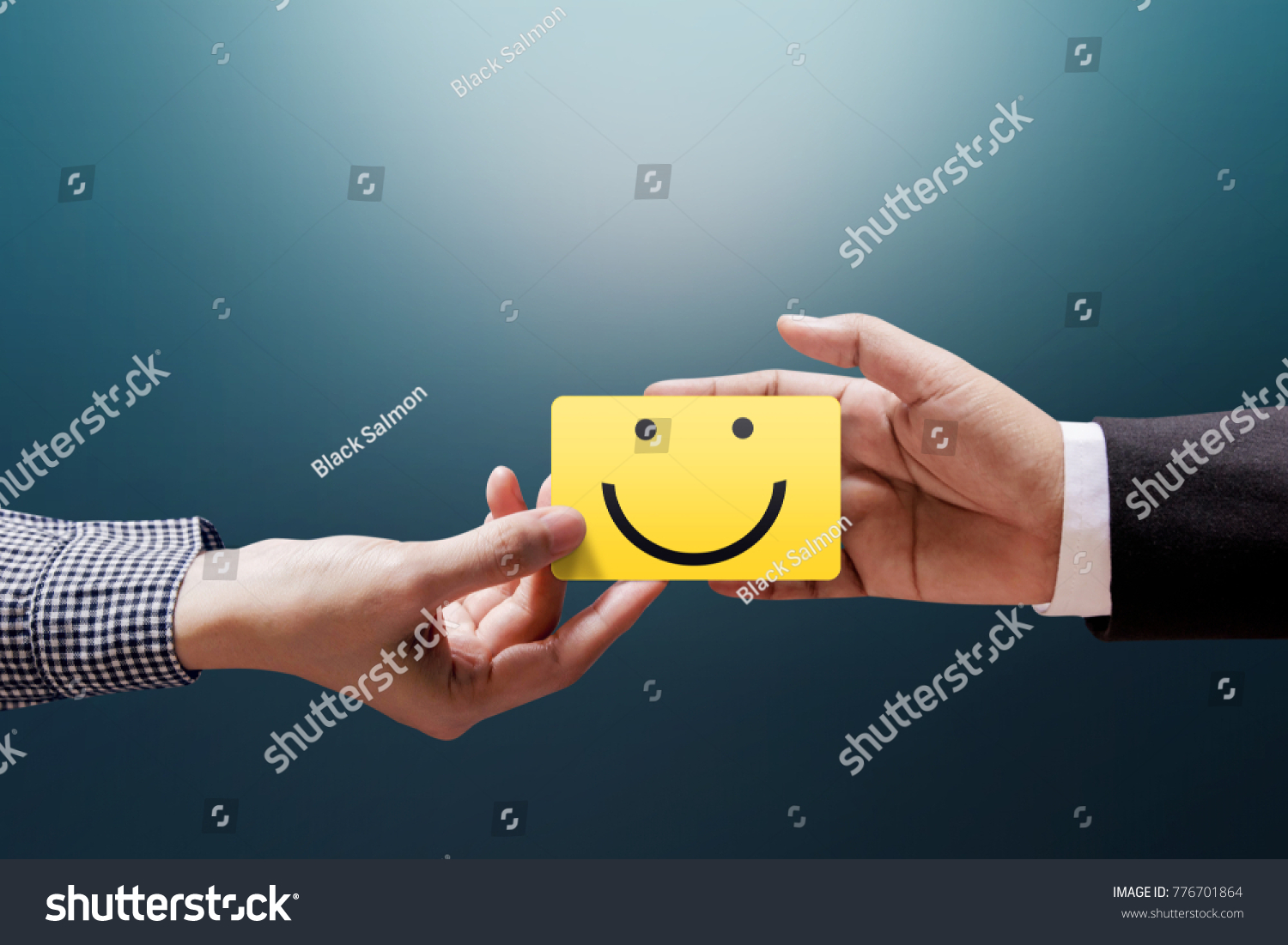 Customer Experience Concept, Happy Client Woman giving a Feedback with Happy Smiley Face Card into a Hand of Businessman #776701864