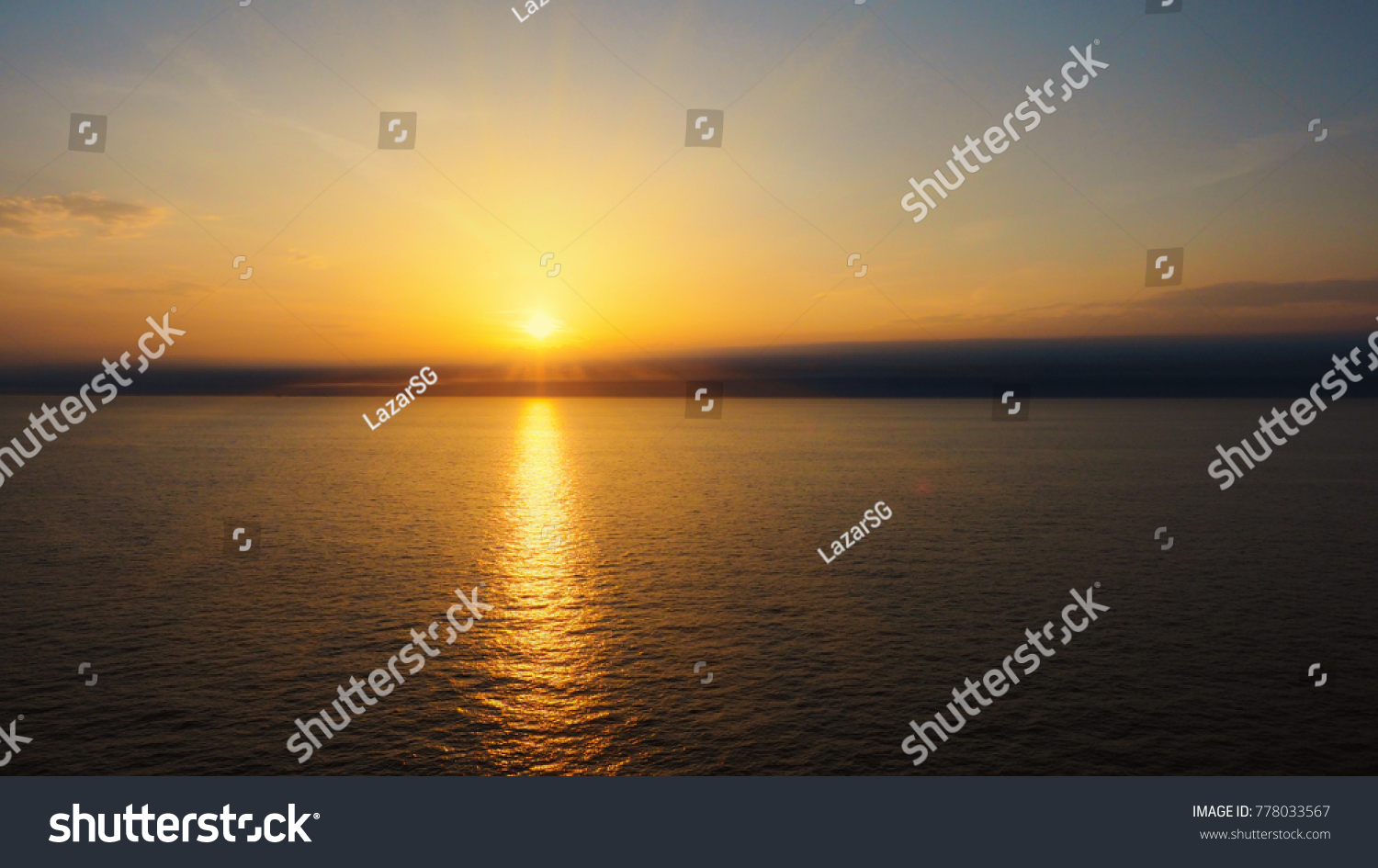 Amazing sundown on opened sea #778033567