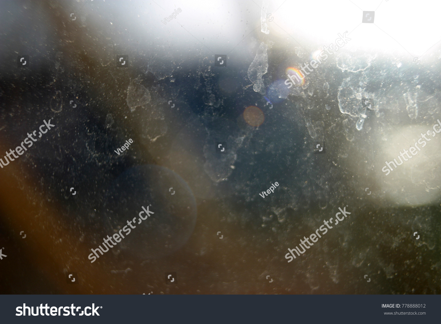 Dirty window with traces of soap, powder close-up #778888012