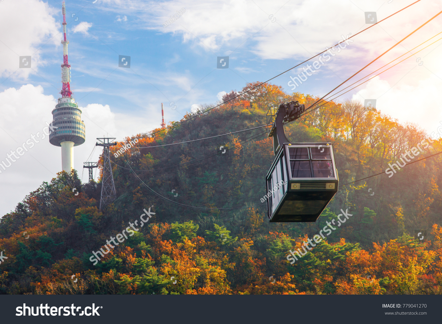 Cable car to Seoul N tower with blue sky and autymn season, Seoul city, South Korea #779041270