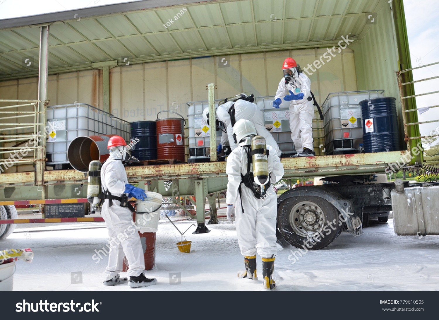 Seremban, Malaysia, 21 December 2017. The special forces Hazmat Fire and Rescue Department of Malaysia, making exercise a chemical spill. #779610505