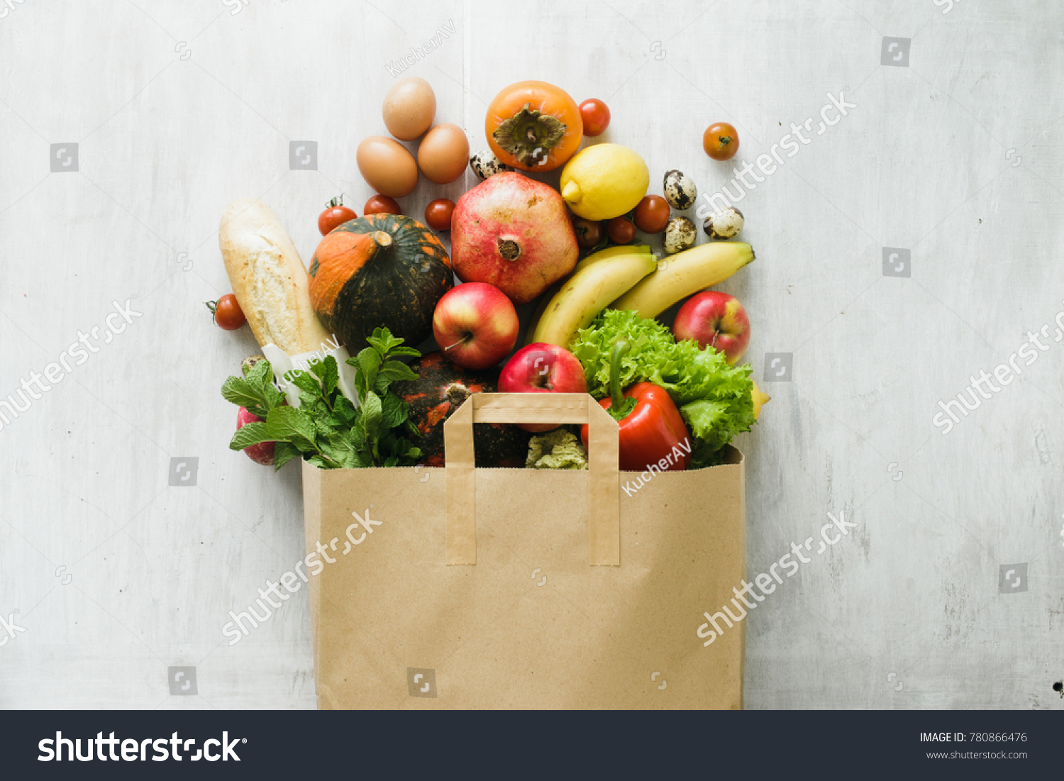 Paper bag of different health food on white wooden background. Top view. Flat lay #780866476