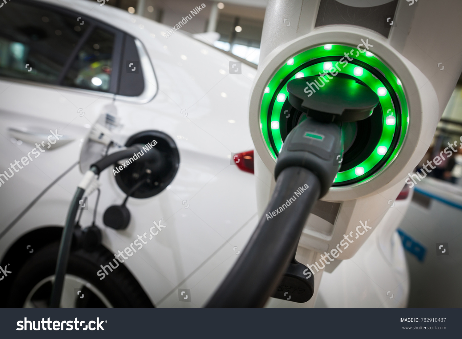 Close up image of the power socket of an electric car, charging. #782910487