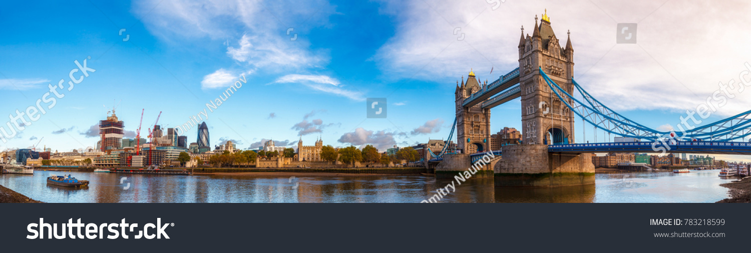 Panoramic London skyline with iconic symbol, the Tower Bridge and Her Majesty's Royal Palace and Fortress, known as the Tower of London as viewed from South Bank of the River Thames in the morning #783218599
