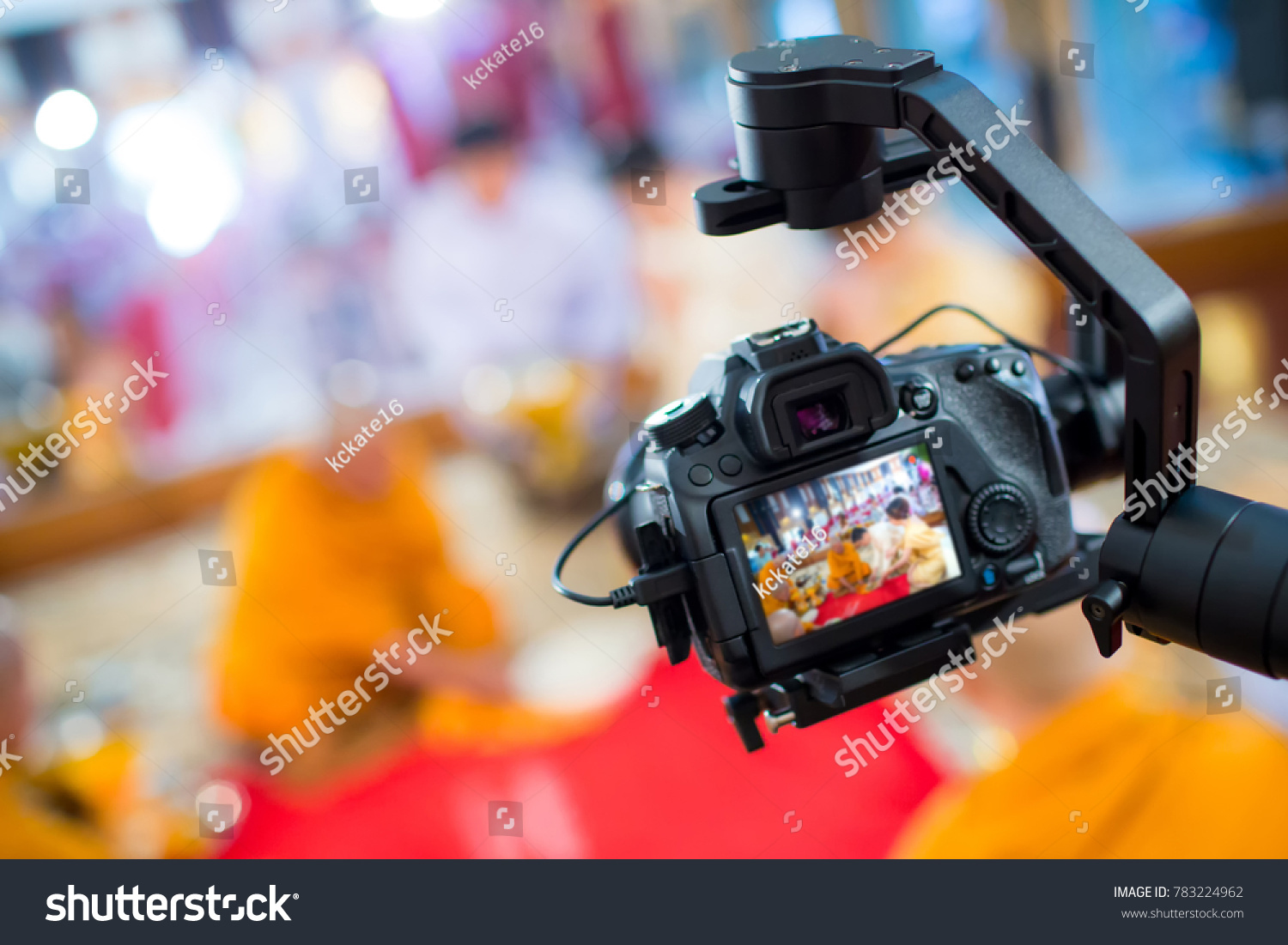 Steadicam with DSLR camera for video production are shooting movie in wedding ceremony. stabilize tool. stabilizer control machine. movie technology. image for background, objects and copy space. #783224962