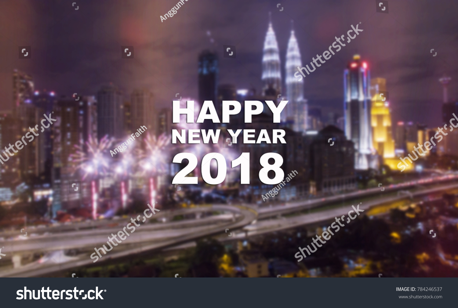 Happy New Year 2018 text on blurred metro city background at night with beautiful firework.Night city scape with fireworks. #784246537