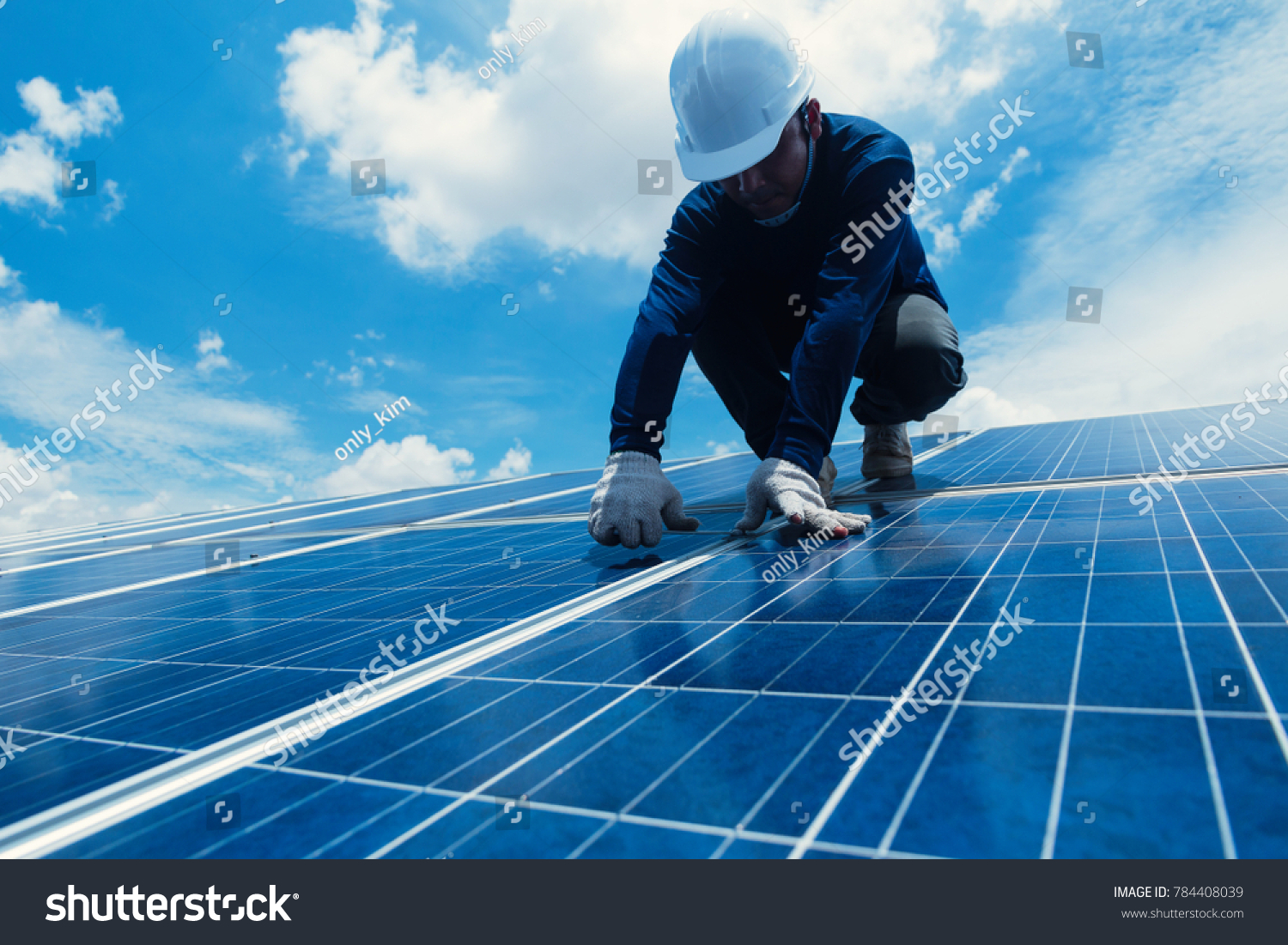engineer team working on replacement solar panel in solar power plant;engineer and electrician team swapping and install solar panel after solar panel voltage drop
 #784408039