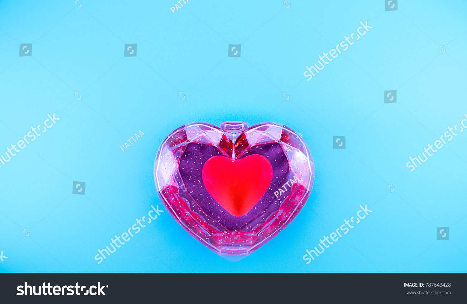 Red heart in the heart-shaped cartridge red on blue background style soft.
Concept:Keep the love for those we love. For valentine's day. #787643428