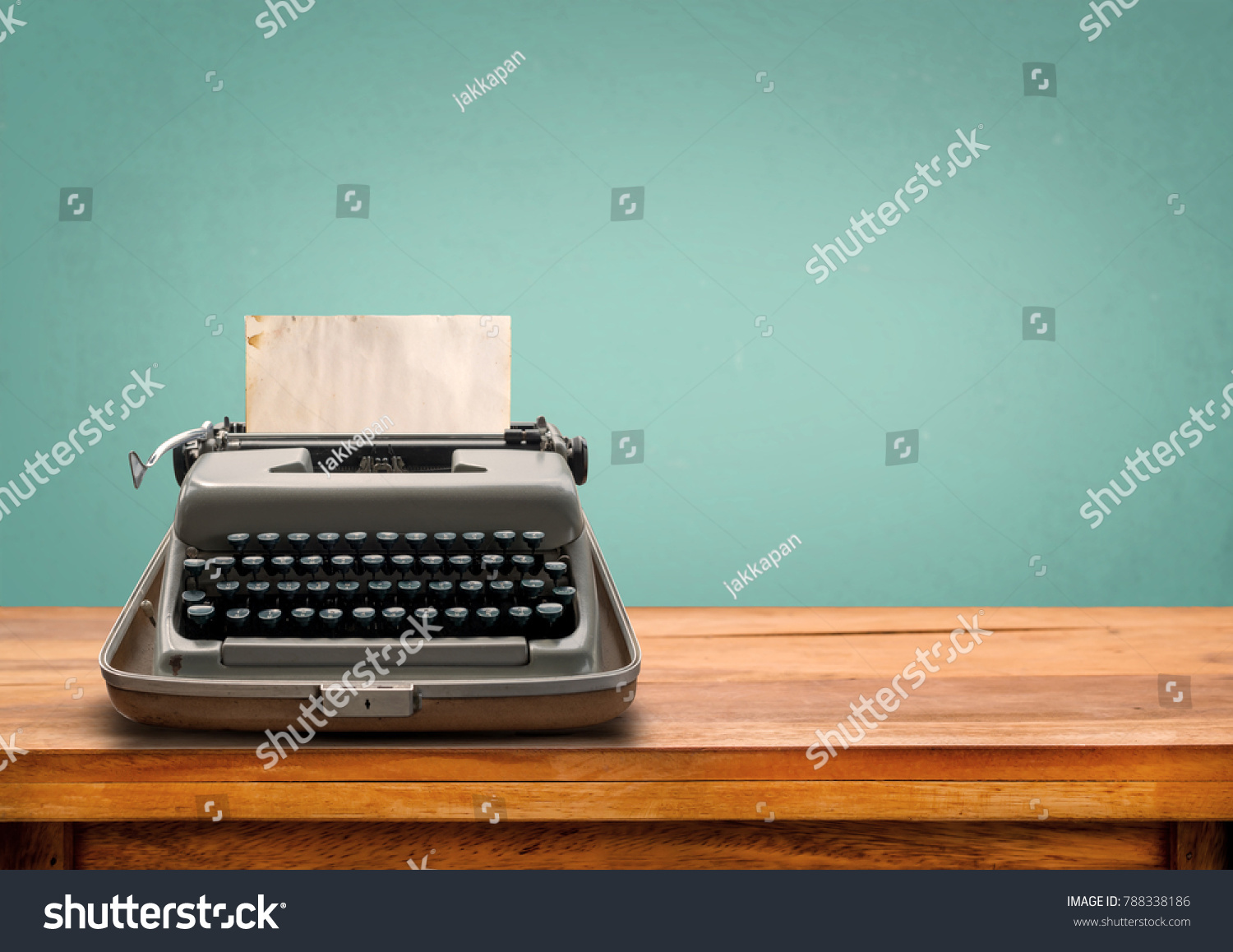Vintage typewriter with old paper. retro machine technology  #788338186