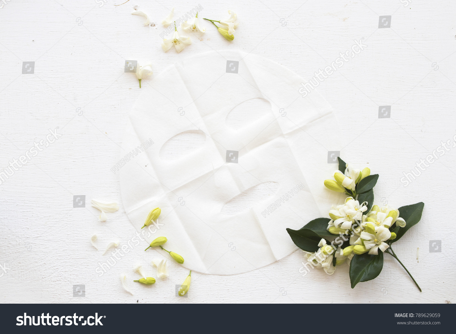 natural sheet mask for face from flower on background white #789629059
