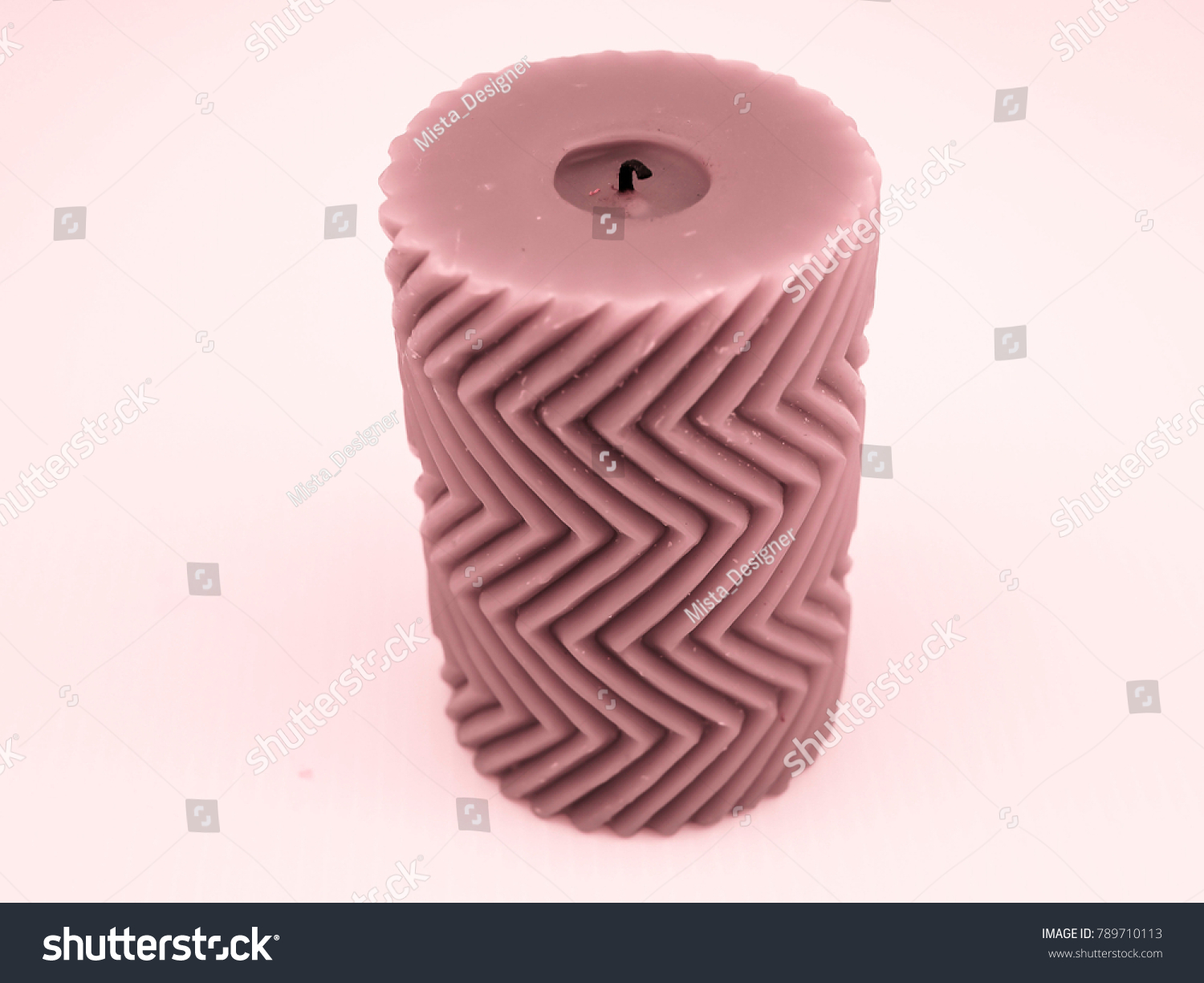 Pink candle with a zigzag pattern #789710113