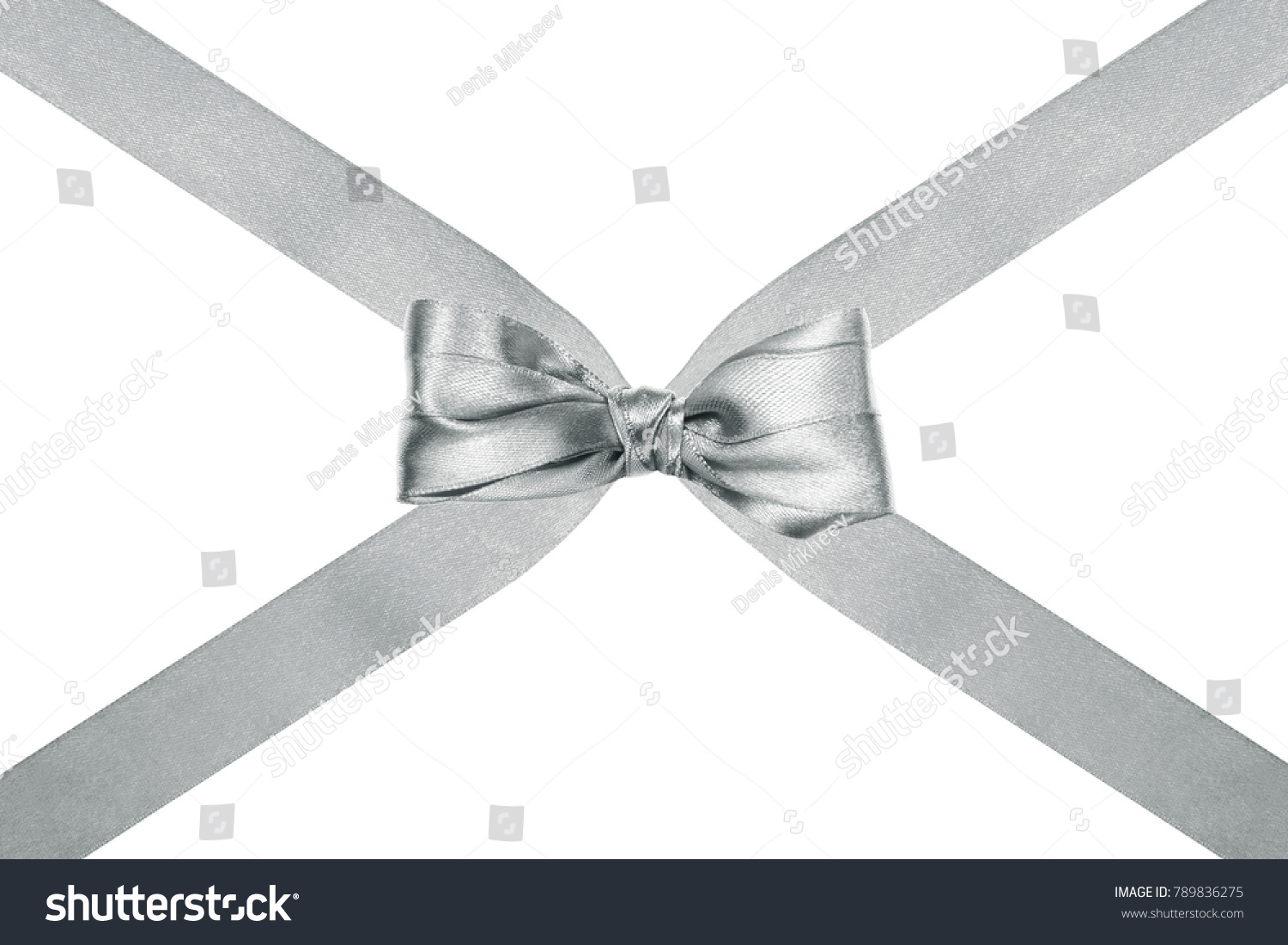 close up of a beautiful silver silk ribbon bow with crosswise ribbons on white background #789836275