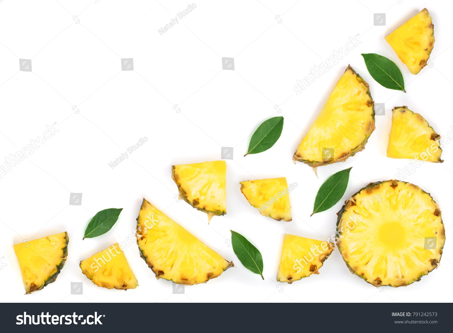Sliced pineapple with green leaves isolated on white background with copy space for your text. Top view #791242573