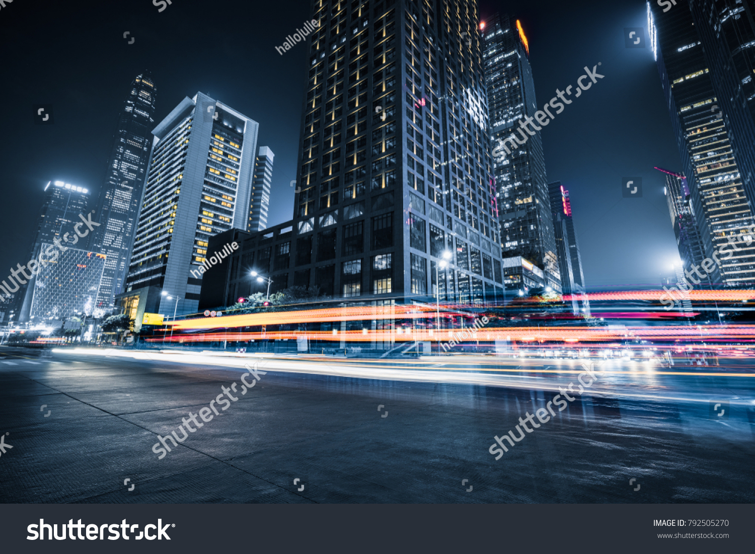 the light trails on the modern building background #792505270
