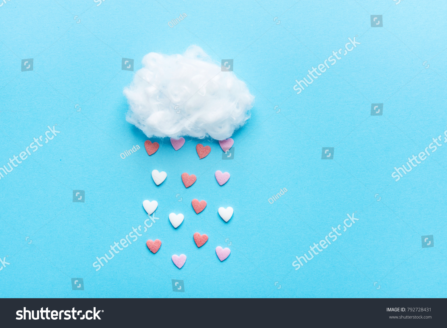 Cotton Ball Cloud Rain Sugar Candy Sprinkle Hearts Red Pink White on Blue Sky Background. Applique Art Composition Kids Style. Valentines Love Charity Concept. Greeting Card Poster Copy Space #792728431