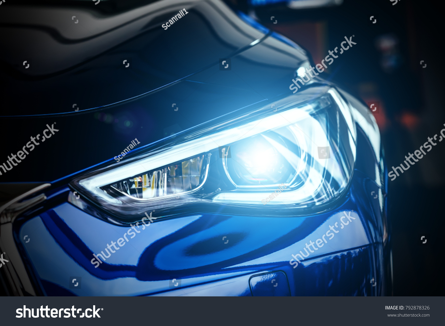 Macro view of modern blue car xenon lamp headlight #792878326