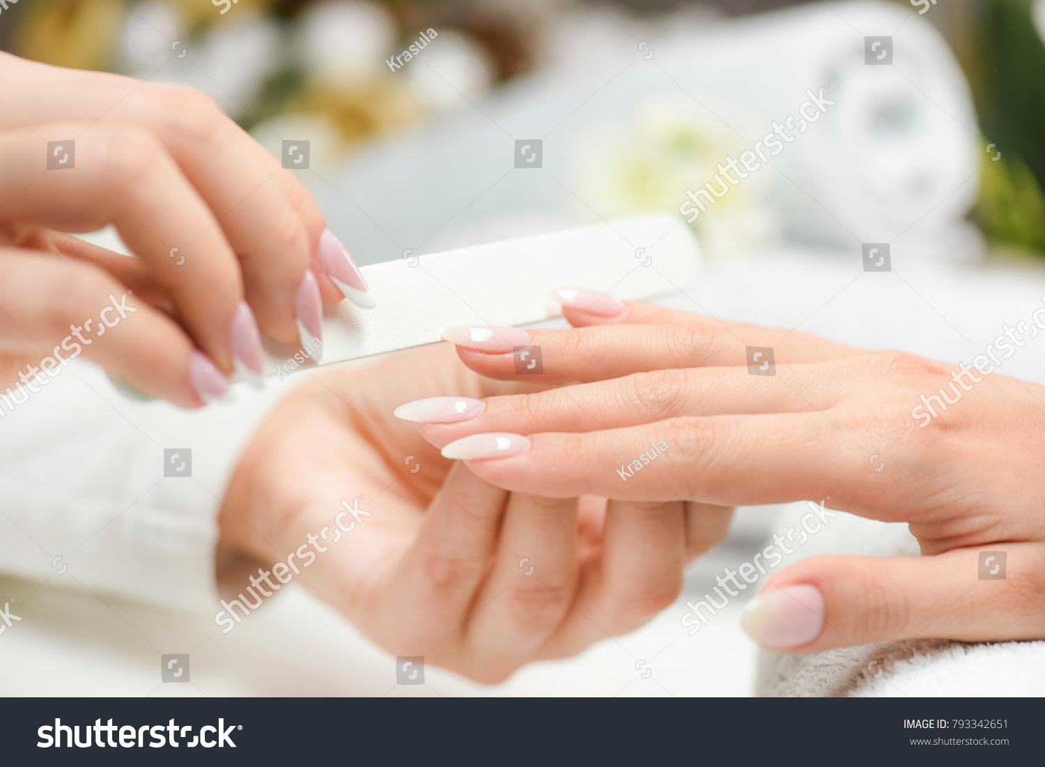 Nails manicure with file. Woman beautiful nail care. after filling. #793342651