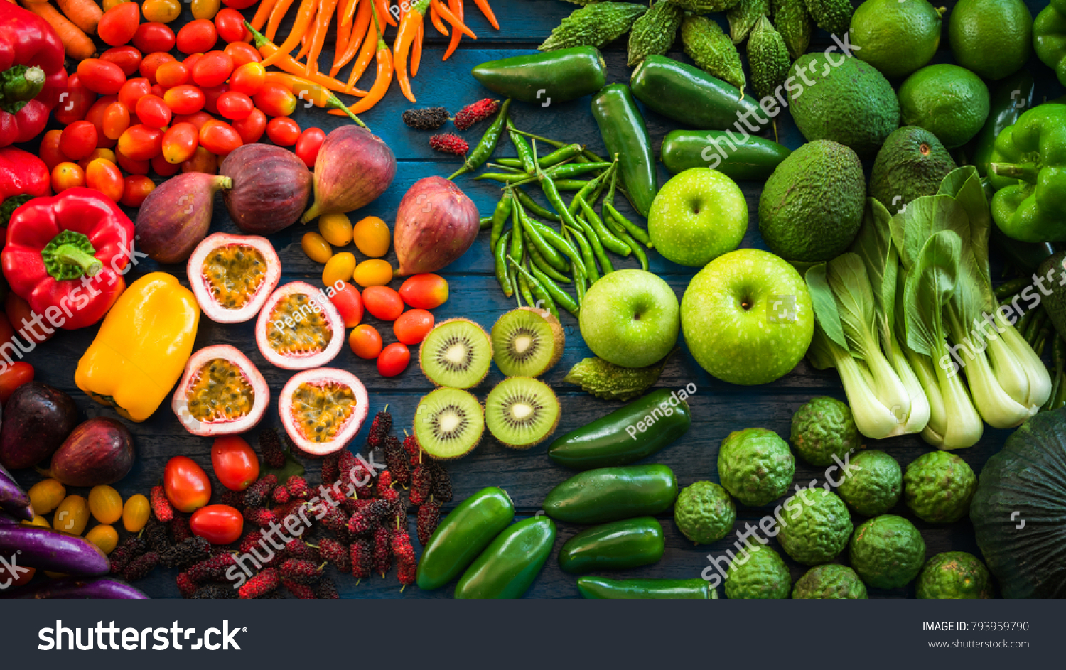 Flat lay of fresh  fruits and vegetables for background, Different fruits and vegetables for eating healthy, Colorful fruits and vegetables on blue plank background #793959790