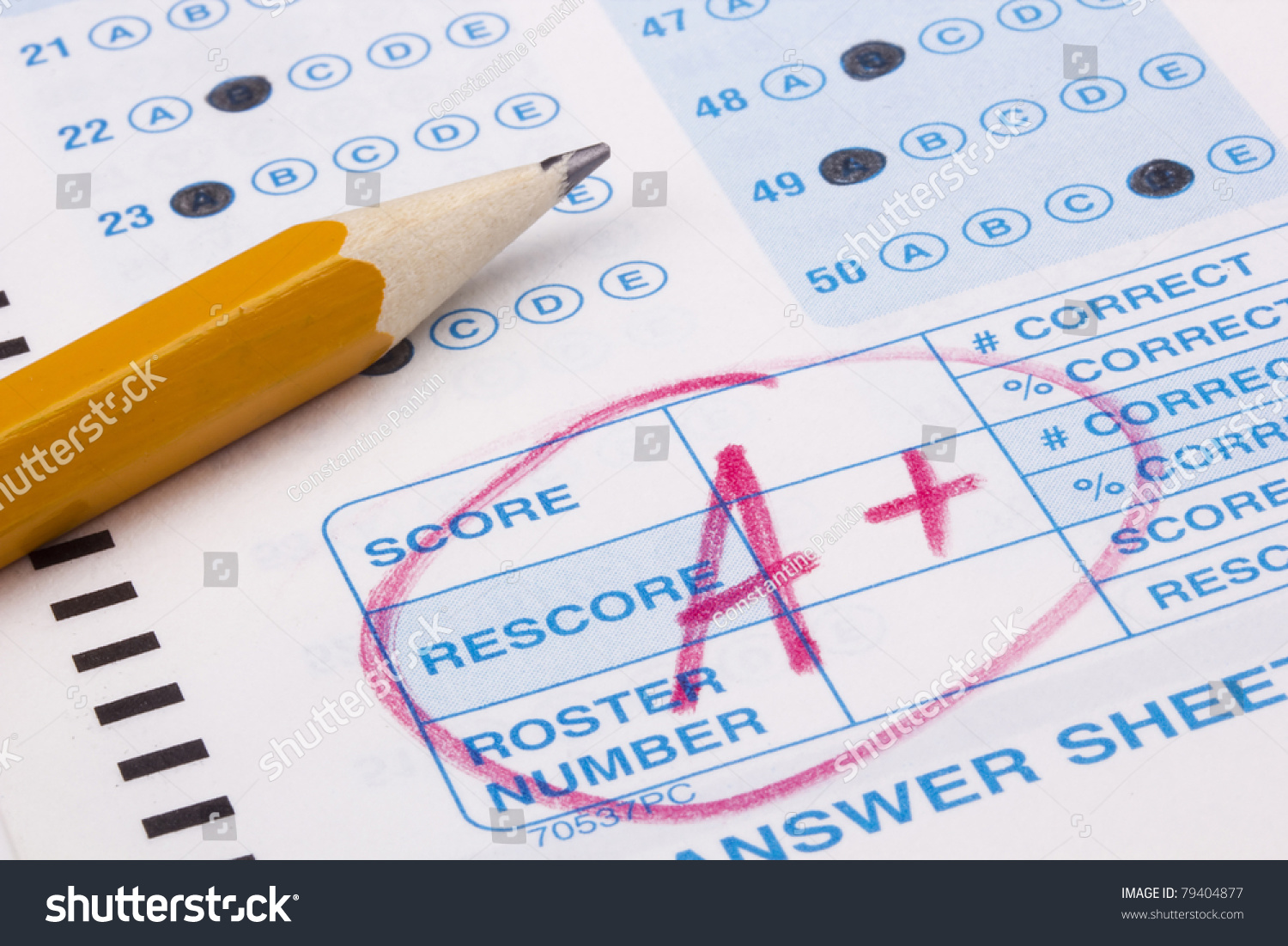 Close-up photograph of a perfect grade on a scantron test. #79404877