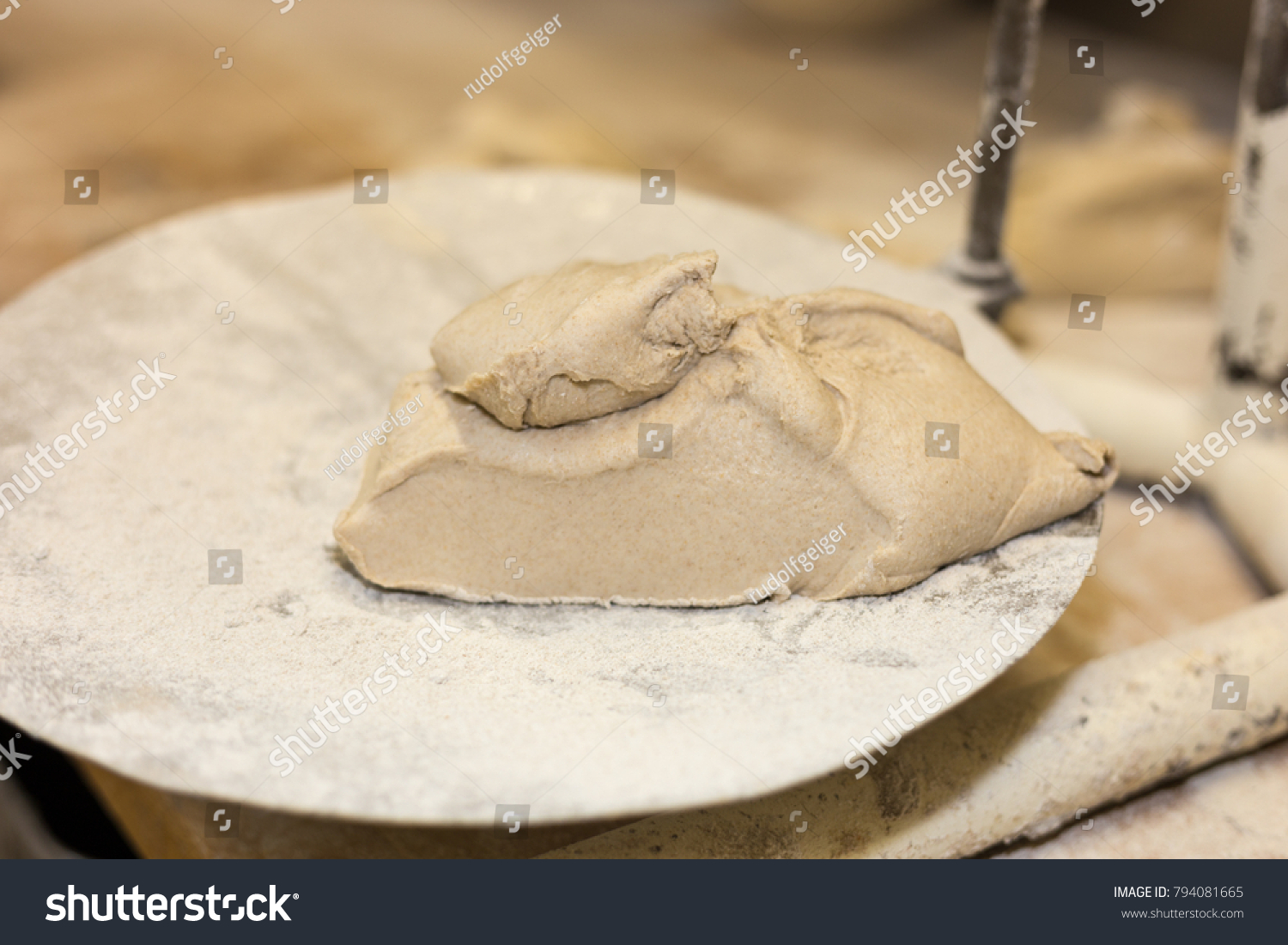 preparation of baked goods in a bakery with tools for preparing pastries #794081665