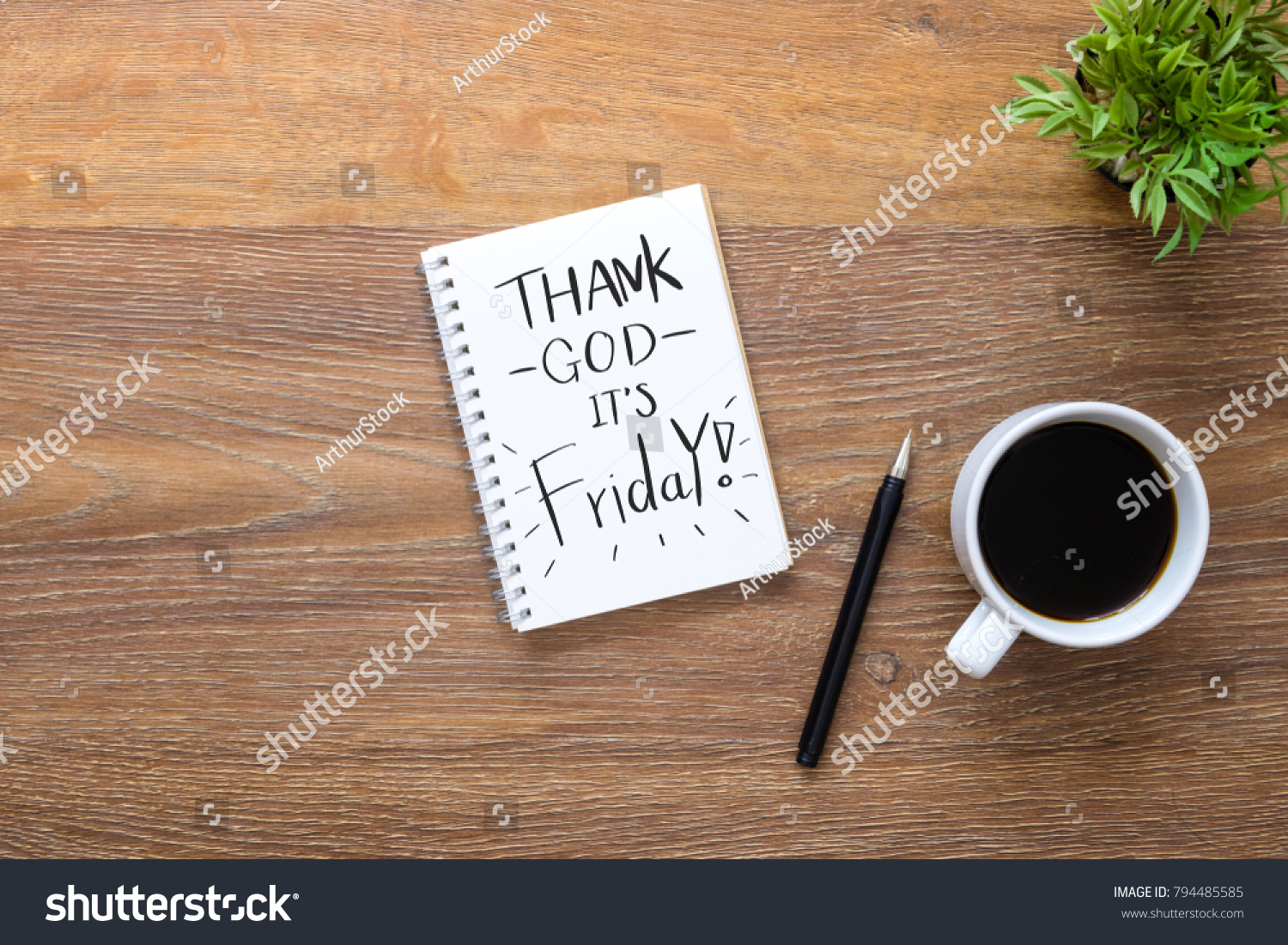 Notebook with Thank God it's Friday text on it. Top view, Friday motivation concept. #794485585