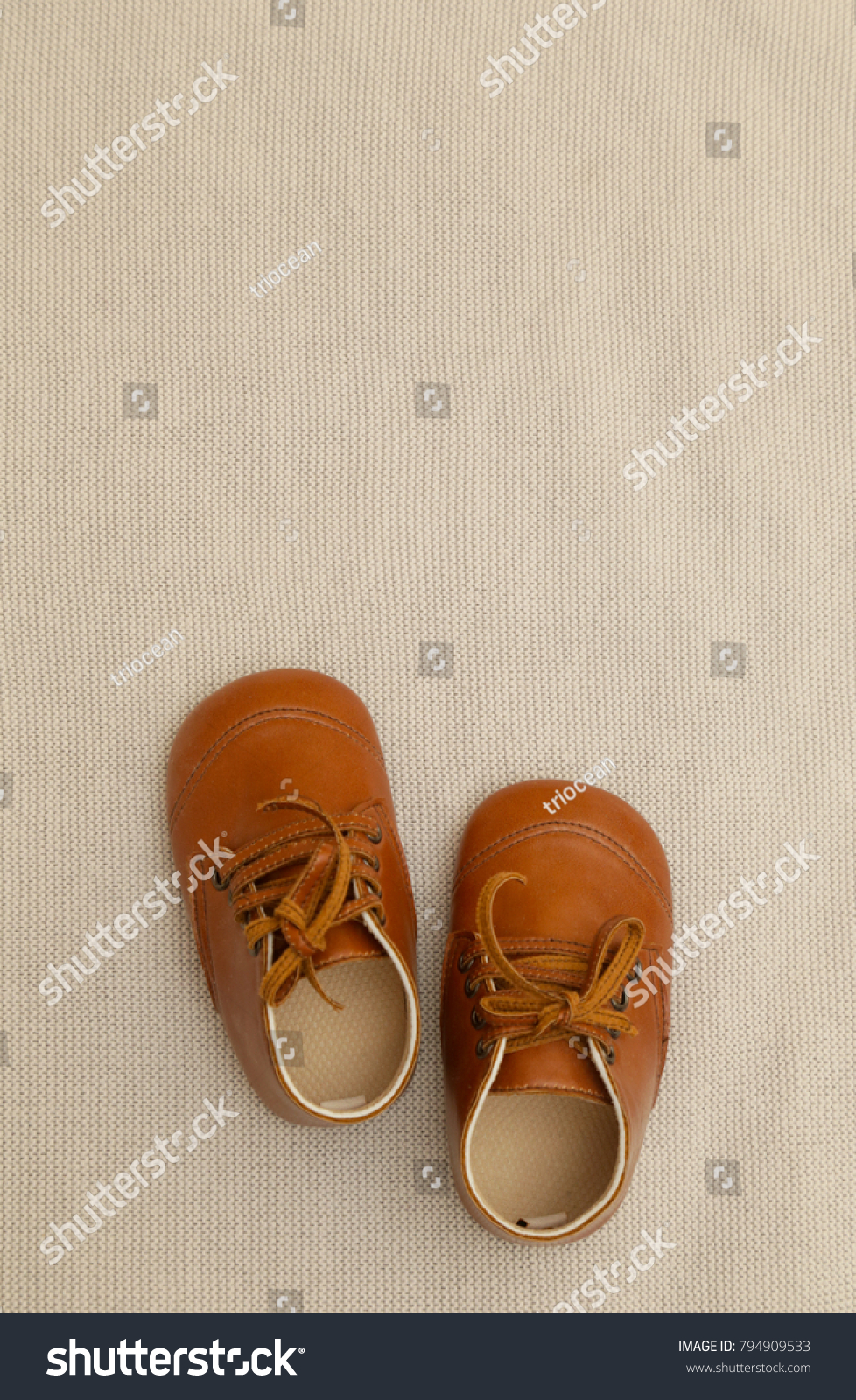 Brown leather baby shoes #794909533