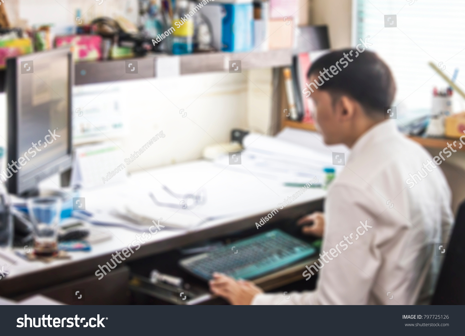Blurry images of people working in companies #797725126