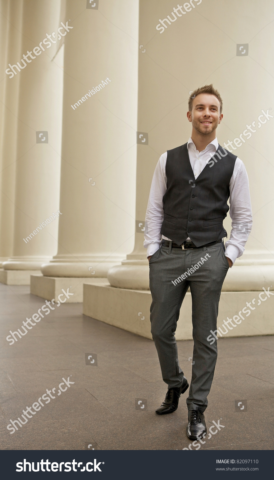 Portrait of a cheerful young businessman #82097110