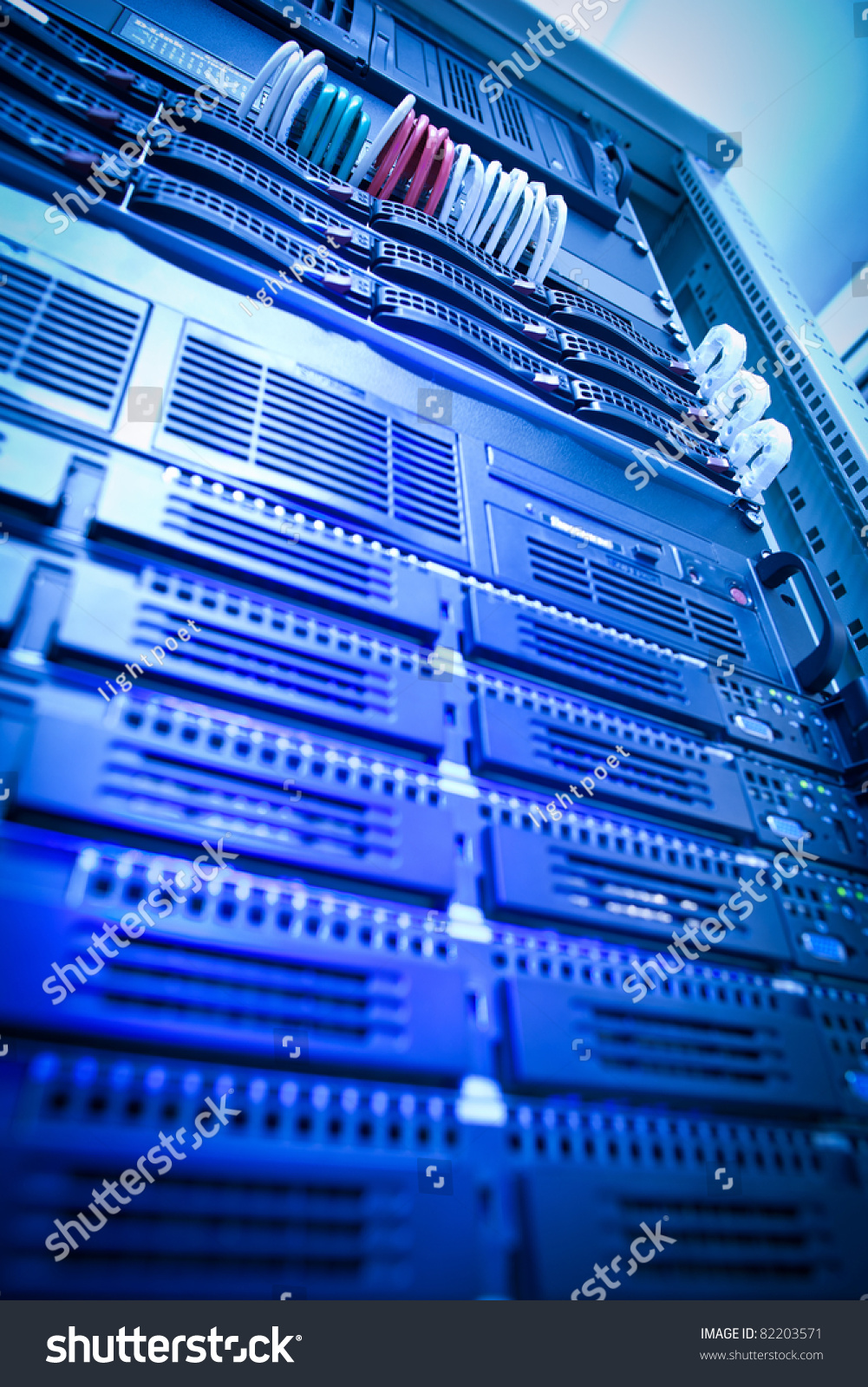 Server rack cluster in a data center (shallow DOF; color toned image) #82203571