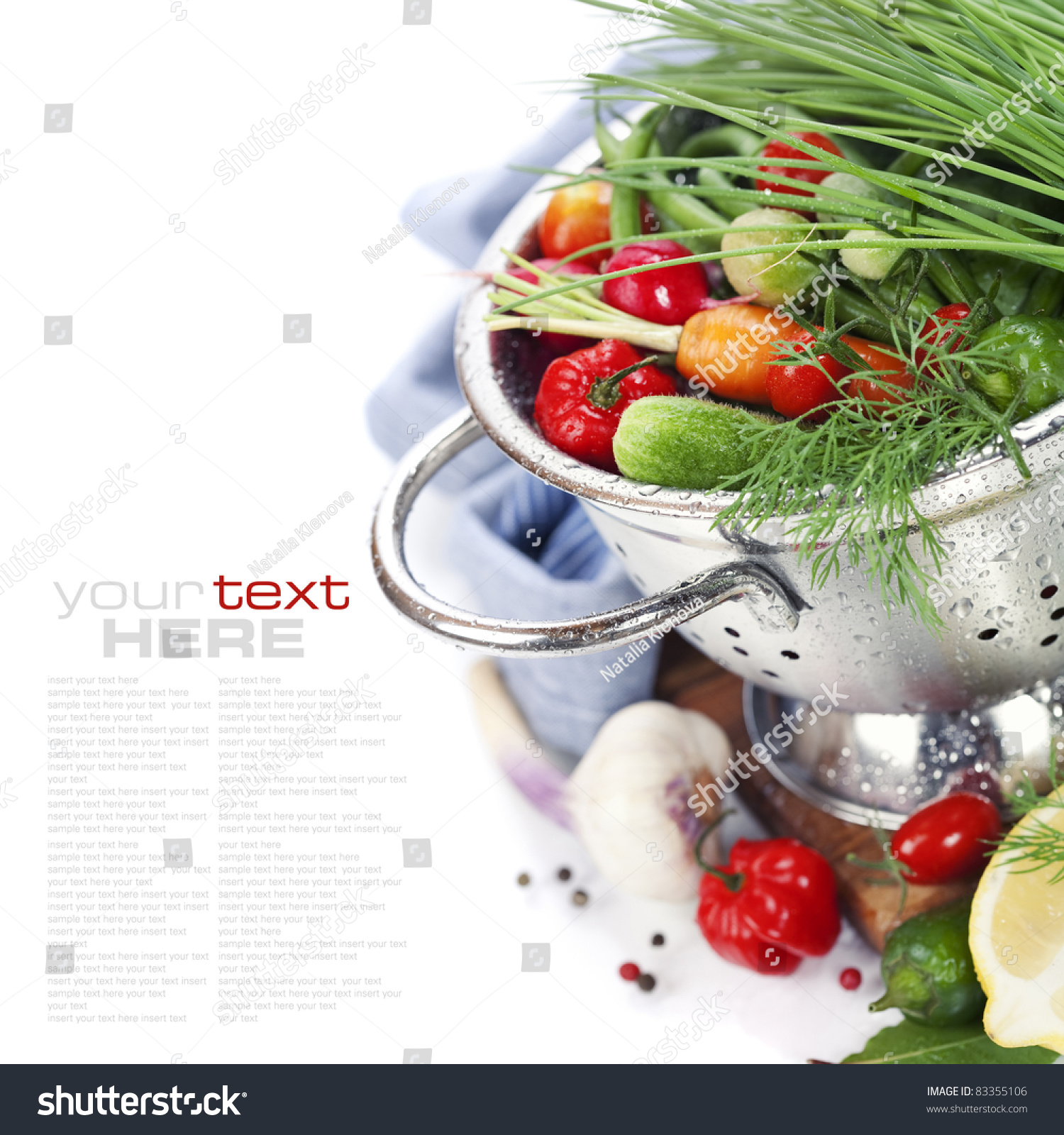 Fresh vegetables in metal colander over white (with sample text) #83355106