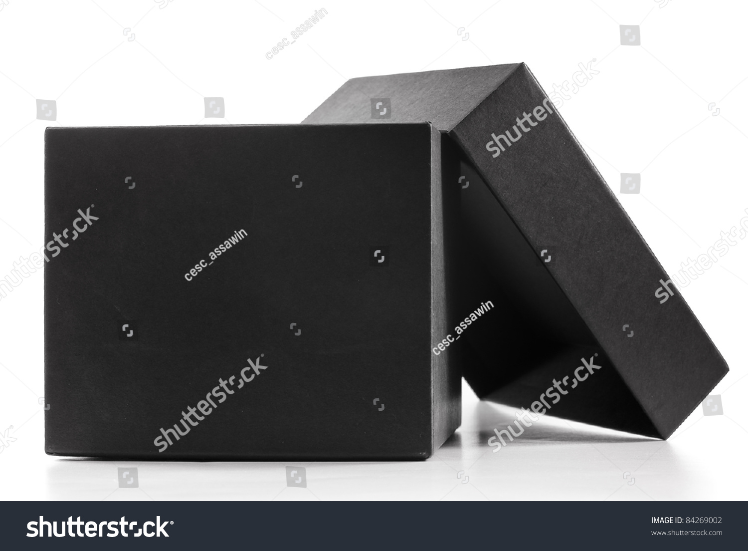 Close-up of an open black gift box, isolated #84269002