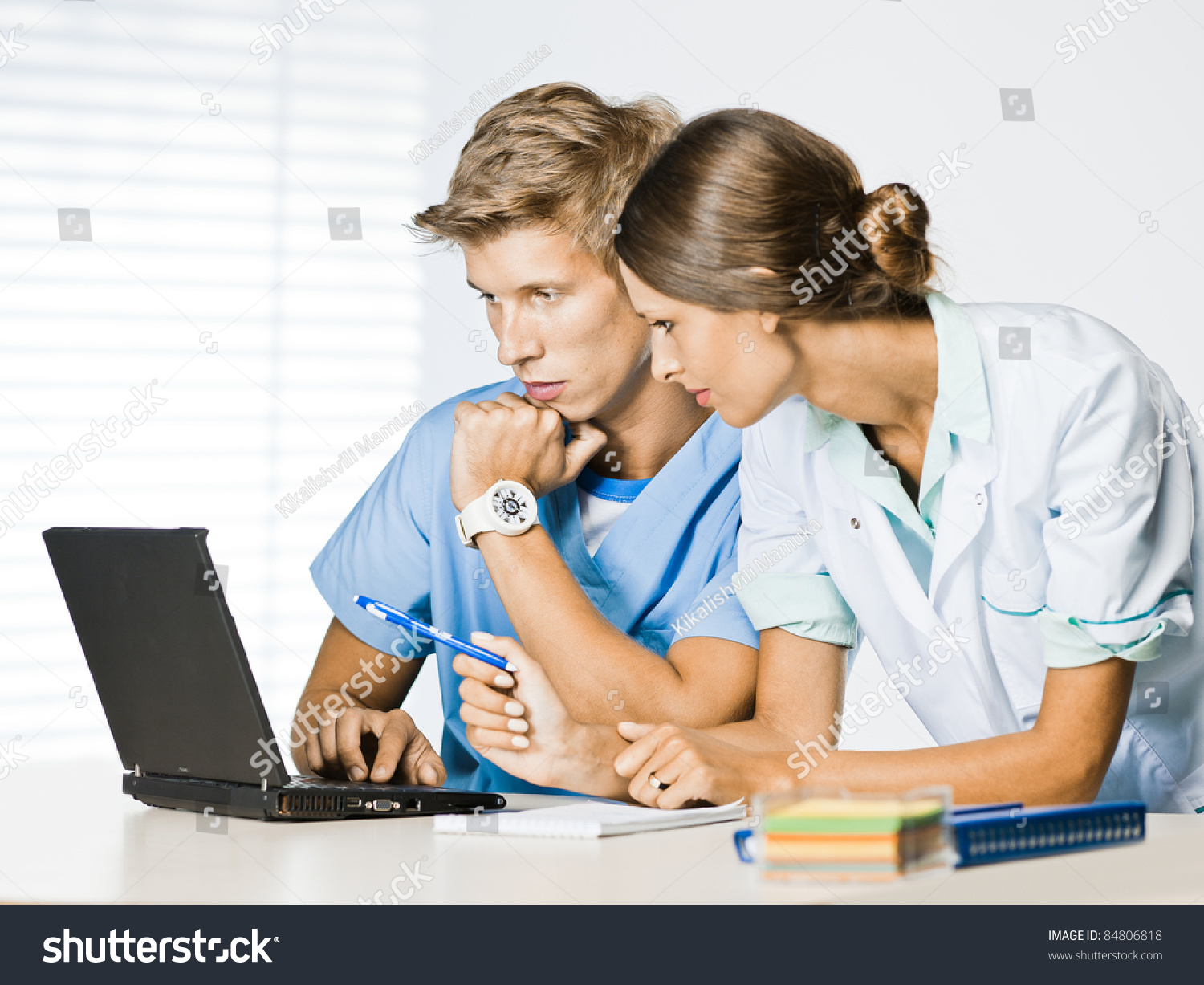 doctor and nurse at computer desk #84806818