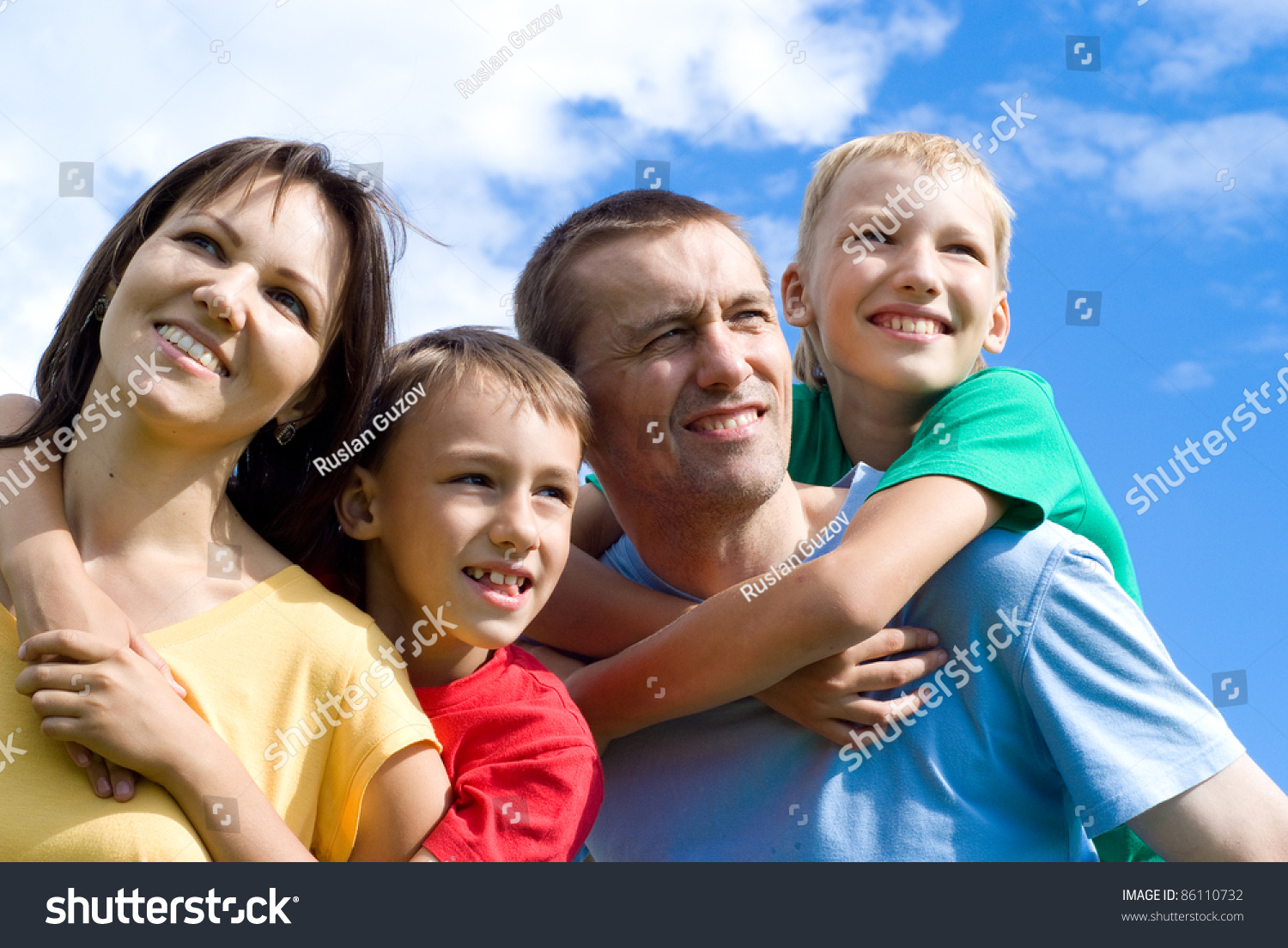 portrait of a cute family on a sky background #86110732