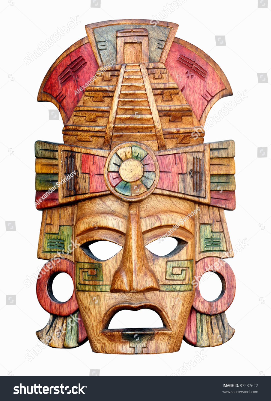 Hand carved wooden Mayan mask isolated on a white background #87237622