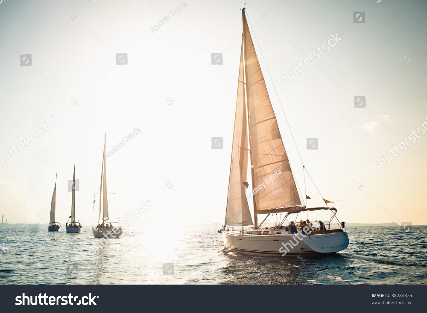 Sailing ship yachts with white sails in a row #88284829
