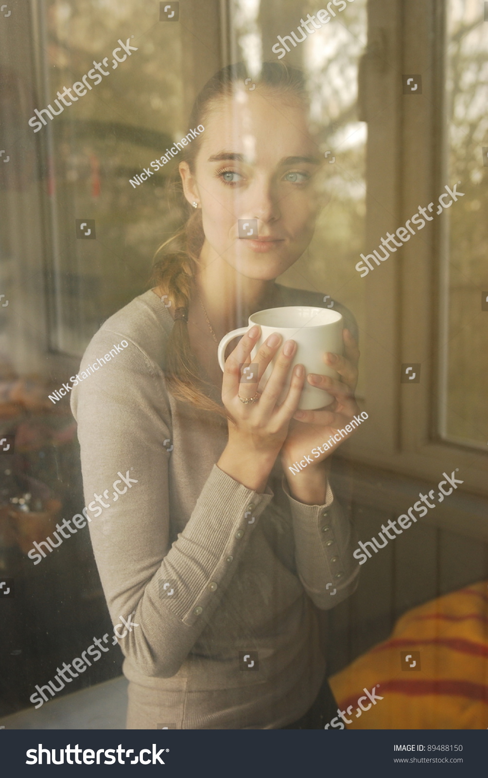 beautiful caucasian woman drinking coffee #89488150