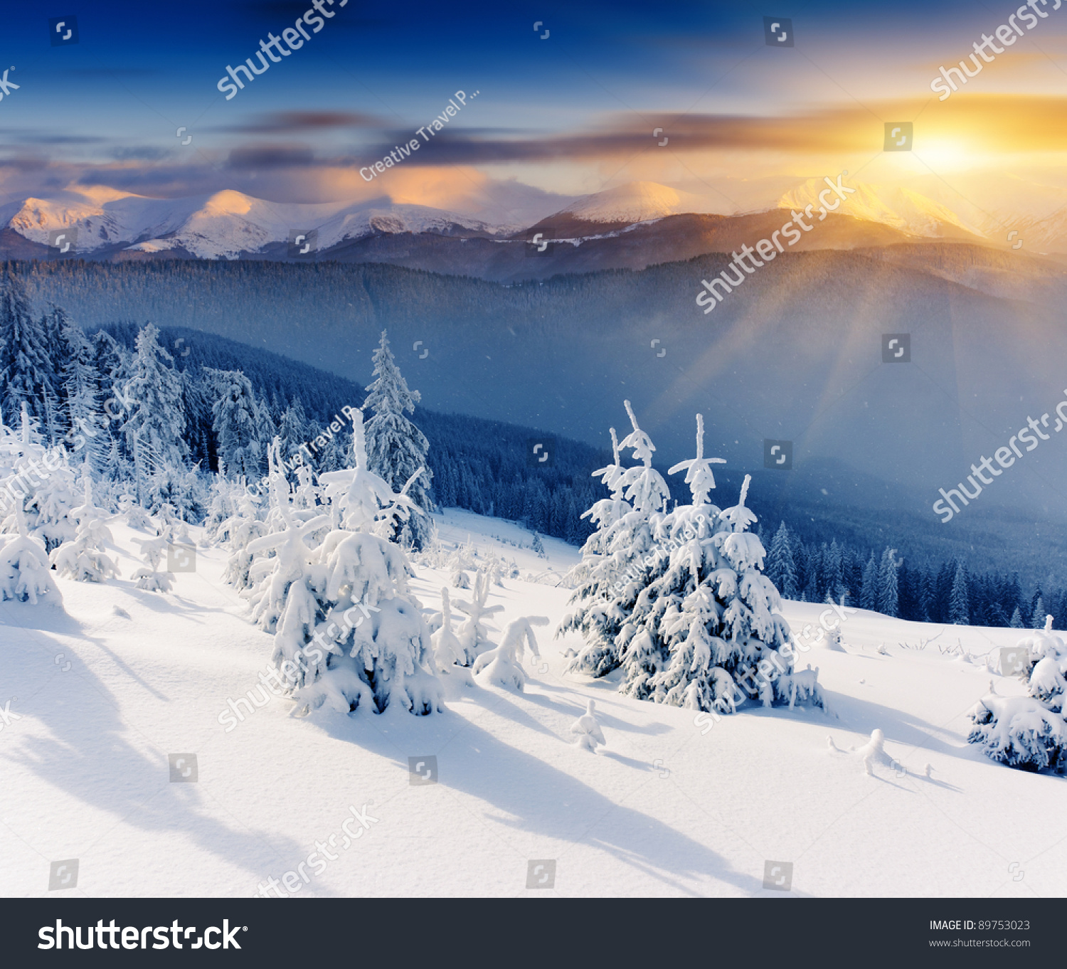 Majestic sunset in the winter mountains landscape. Dramatic sky. #89753023