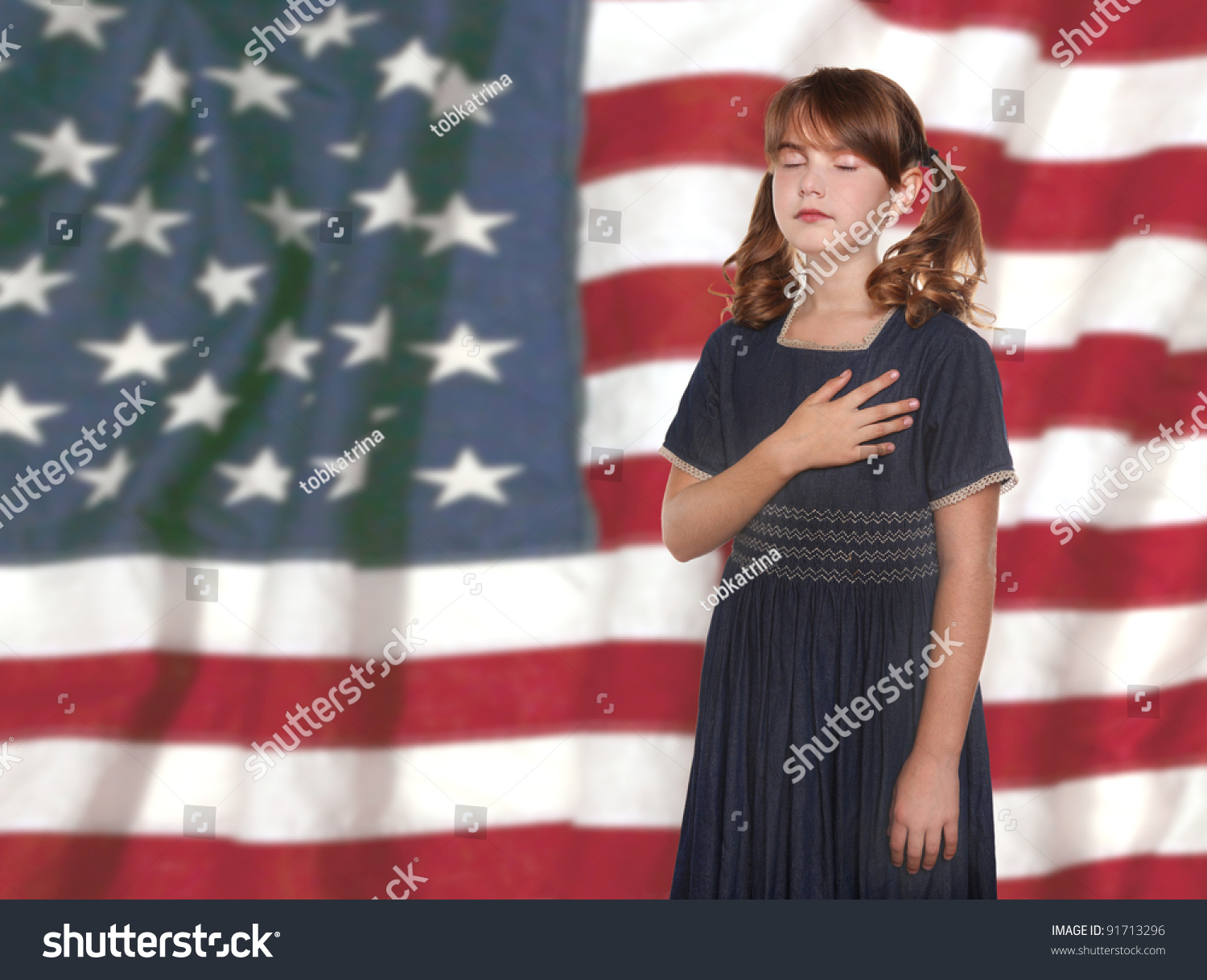Patriotic Child Saying Pledge of Allegiance to the Flag #91713296