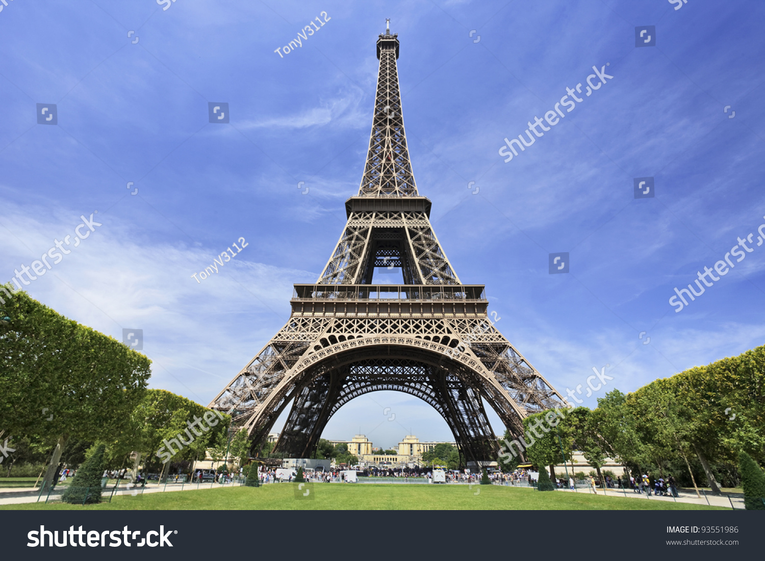The famous Eiffel Tower in Paris against a dramatic blue sky #93551986