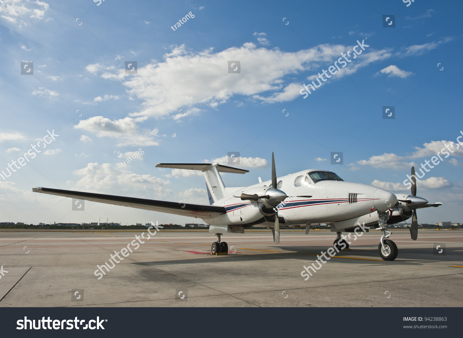 Propeller plane parking at the airport #94238863