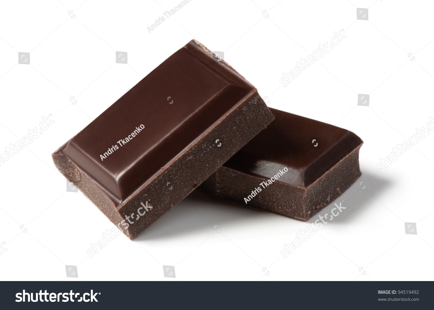 Two pieces of chocolate isolated on white background. Cleaned and retouched photo. #94519492
