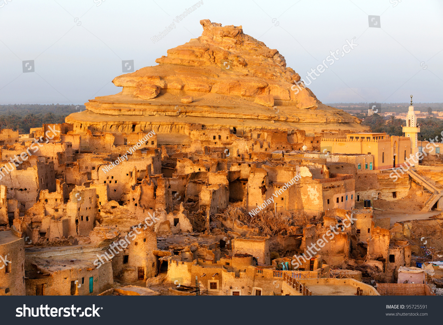 View of the Shali Fortress in Siwa Oasis is an oasis in Egypt, located between the Qattara Depression and the Egyptian Sand Sea in the Libyan Desert. #95725591