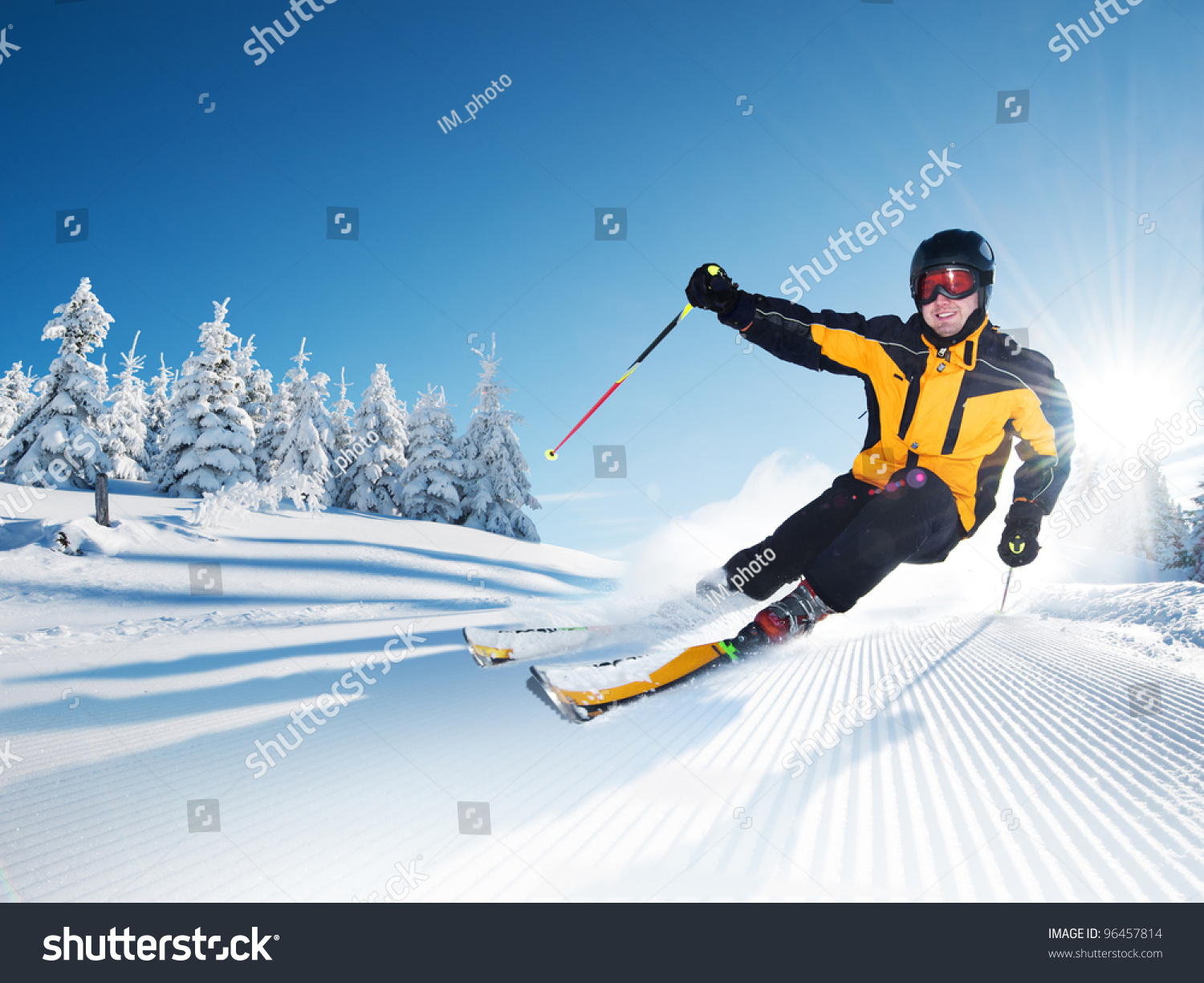 Skier in mountains, prepared piste and sunny day #96457814