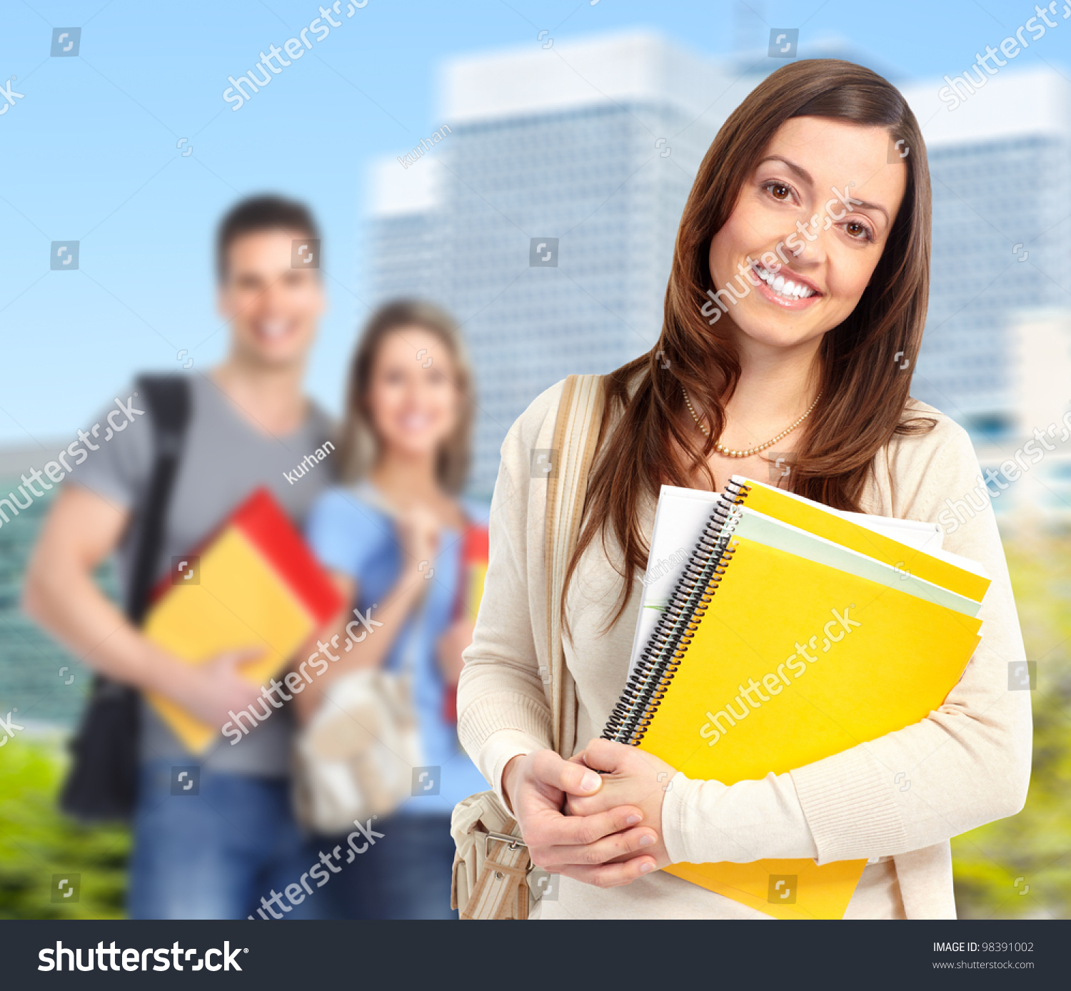 Young smiling  student woman with book. University education. #98391002