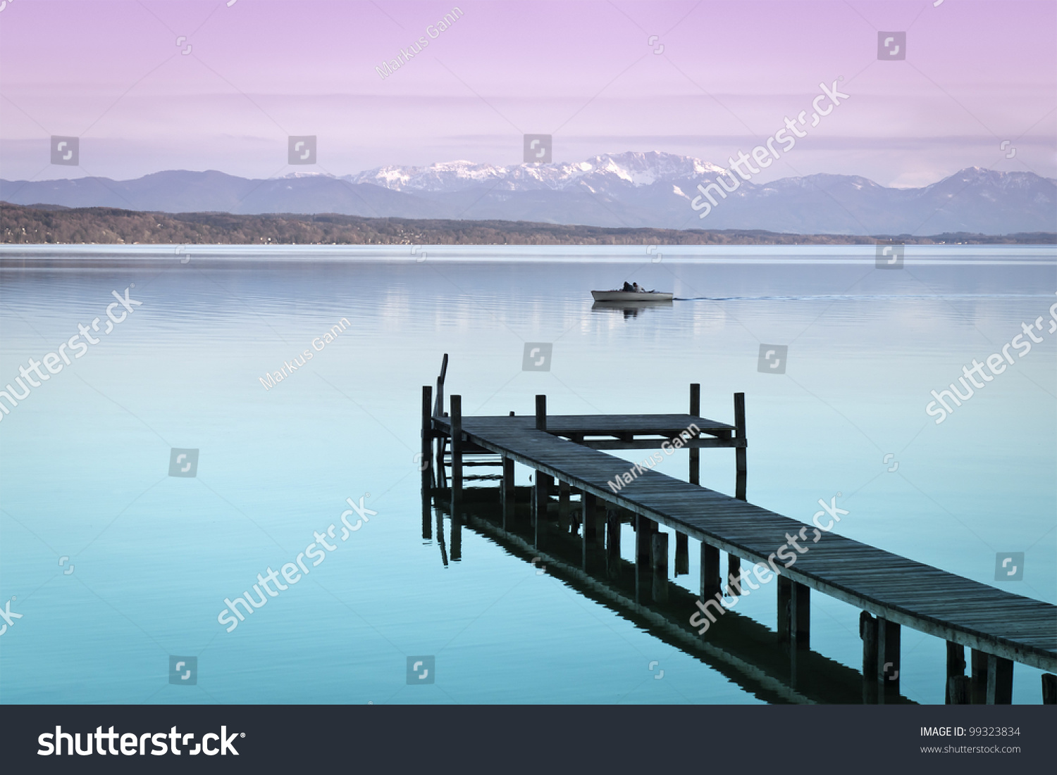 An image of a wooden jetty at the lake Starnberg in Bavaria Germany #99323834