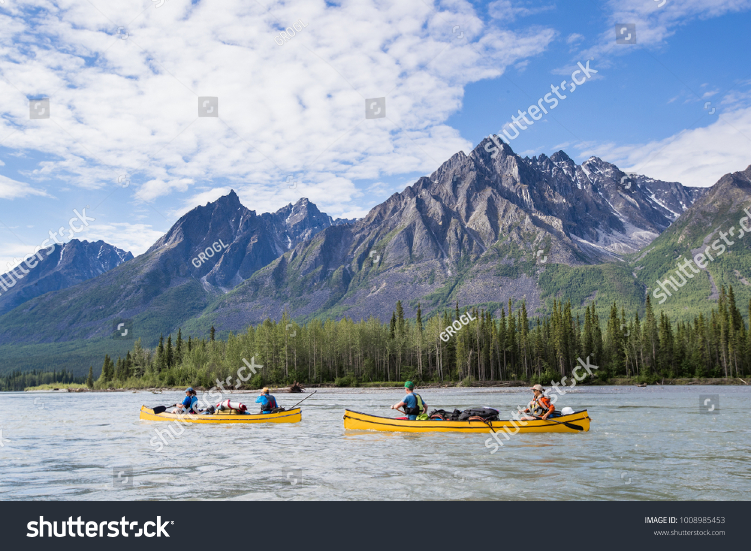 Group paddling down the whitewater of the Nahanni River in the Northwest Territories. #1008985453