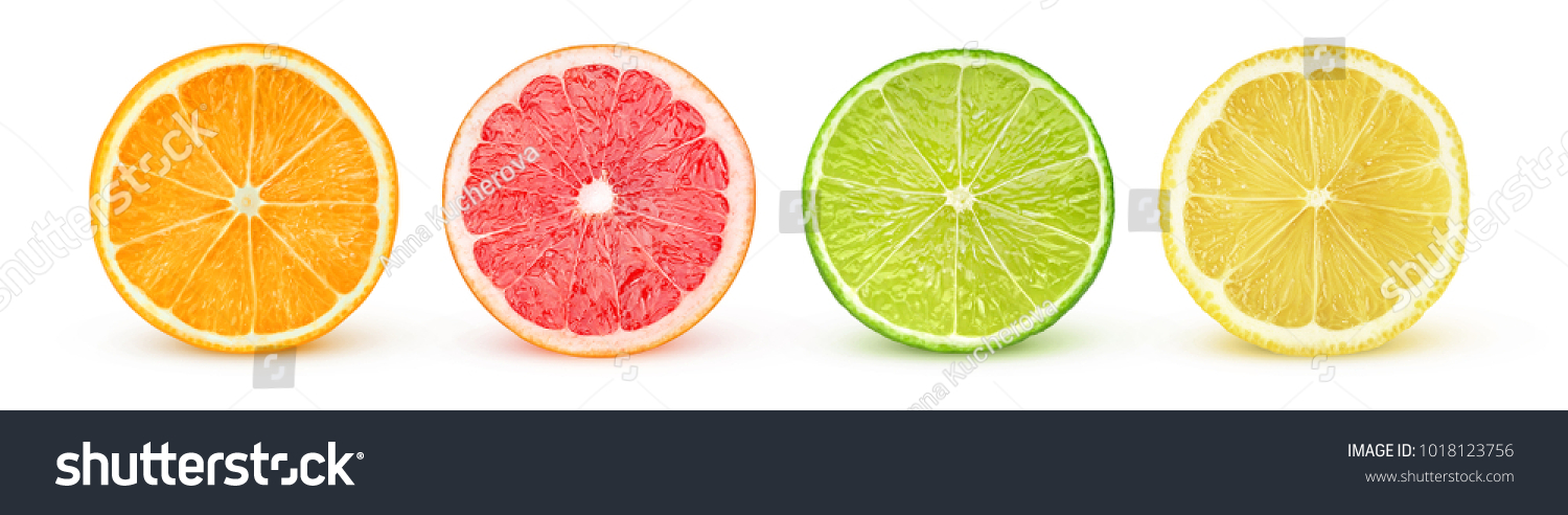 Isolated citrus slices. Fresh fruits cut in half (orange, pink grapefruit, lime, lemon) in a row isolated on white background with clipping path #1018123756